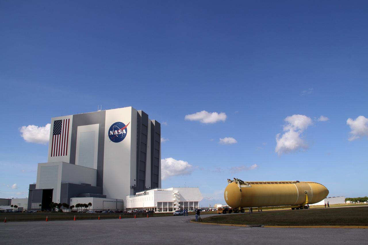 CAPE CANAVERAL, Fla. – External tank 134 is towed toward the Vehicle Assembly Building, or VAB, at NASA's Kennedy Space Center in Florida.  The Pegasus barge, carrying the fuel tank, arrived in Florida after an ocean voyage towed by a solid rocket booster retrieval ship from NASA's Michoud Assembly Facility near New Orleans. Next, the tank will be transported into the VAB where it will be stored until needed.    ET-134 will be used to launch space shuttle Endeavour on the STS-130 mission to the International Space Station. Launch is targeted for Feb. 4, 2010.  For information on the components of the space shuttle and the STS-130 mission, visit http://www.nasa.gov/shuttle. Photo credit: NASA/Jack Pfaller