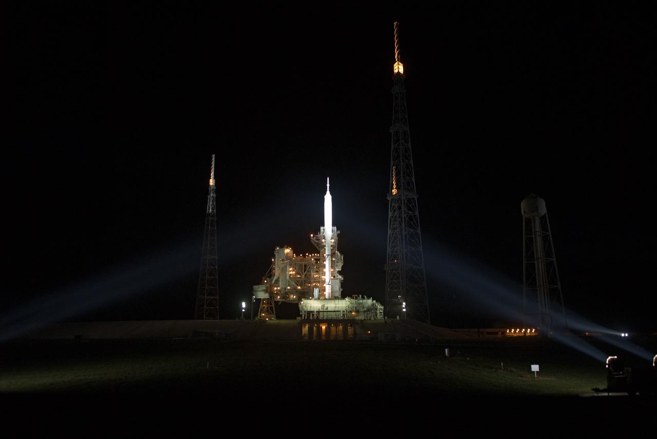 CAPE CANAVERAL, Fla. - As nightfall comes to Launch Complex 39B at NASA's Kennedy Space Center in Florida, xenon lights reveal the Ares I-X rocket awaiting the approaching liftoff of its flight test.    This is the first time since the Apollo Program's Saturn rockets were retired that a vehicle other than the space shuttle has occupied the pad.   Part of the Constellation Program, the Ares I-X is the test vehicle for the Ares I.  The Ares I-X flight test is set for Oct. 27.  For information on the Ares I-X vehicle and flight test, visit http://www.nasa.gov/aresIX. Photo credit: NASA/Kim Shiflett