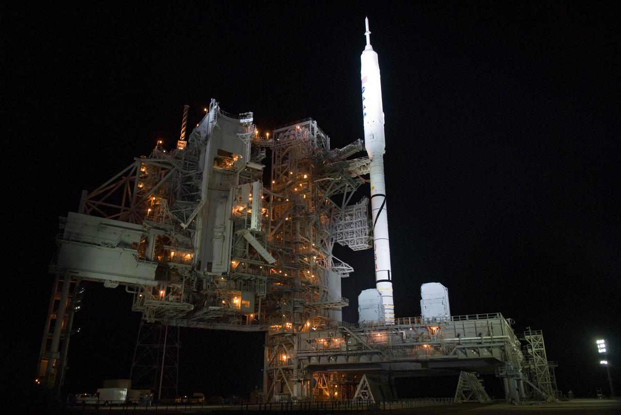 CAPE CANAVERAL, Fla. - As nightfall comes to Launch Complex 39B at NASA's Kennedy Space Center in Florida, xenon lights reveal the Ares I-X rocket awaiting the approaching liftoff of its flight test.    This is the first time since the Apollo Program's Saturn rockets were retired that a vehicle other than the space shuttle has occupied the pad.   Part of the Constellation Program, the Ares I-X is the test vehicle for the Ares I.  The Ares I-X flight test is set for Oct. 27.  For information on the Ares I-X vehicle and flight test, visit http://www.nasa.gov/aresIX. Photo credit: NASA/Kim Shiflett