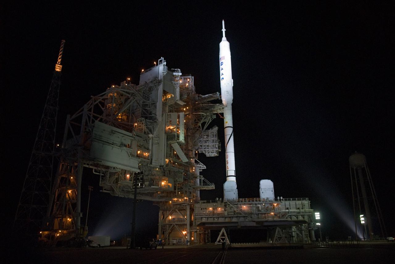 CAPE CANAVERAL, Fla. - As night settles over Launch Complex 39B at NASA's Kennedy Space Center in Florida, xenon lights reveal the Ares I-X rocket awaiting the approaching liftoff of its flight test. This is the first time since the Apollo Program's Saturn rockets were retired that a vehicle other than the space shuttle has occupied the pad. Part of the Constellation Program, the Ares I-X is the test vehicle for the Ares I. The Ares I-X flight test is set for Oct. 27. For information on the Ares I-X vehicle and flight test, visit http://www.nasa.gov/aresIX. Photo credit: NASA/Kim Shiflett