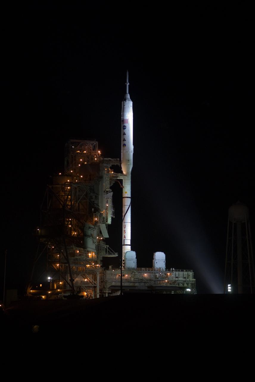 CAPE CANAVERAL, Fla. - As night settles over Launch Complex 39B at NASA's Kennedy Space Center in Florida, xenon lights reveal the Ares I-X rocket awaiting the approaching liftoff of its flight test. This is the first time since the Apollo Program's Saturn rockets were retired that a vehicle other than the space shuttle has occupied the pad. Part of the Constellation Program, the Ares I-X is the test vehicle for the Ares I. The Ares I-X flight test is set for Oct. 27. For information on the Ares I-X vehicle and flight test, visit http://www.nasa.gov/aresIX. Photo credit: NASA/Kim Shiflett