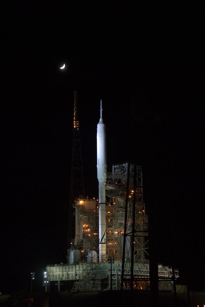 CAPE CANAVERAL, Fla. - As night settles over Launch Complex 39B at NASA's Kennedy Space Center in Florida, xenon lights reveal the Ares I-X rocket awaiting the approaching liftoff of its flight test.    This is the first time since the Apollo Program's Saturn rockets were retired that a vehicle other than the space shuttle has occupied the pad.   Part of the Constellation Program, the Ares I-X is the test vehicle for the Ares I.  The Ares I-X flight test is set for Oct. 27.  For information on the Ares I-X vehicle and flight test, visit http://www.nasa.gov/aresIX. Photo credit: NASA/Kim Shiflett