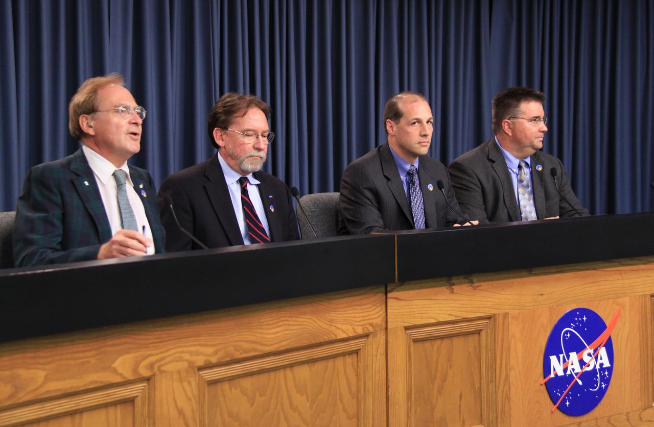 CAPE CANAVERAL, Fla. - At NASA's Kennedy Space Center in Florida, a news conference is held in the Press Site auditorium following the conclusion of the flight test readiness review, or FTRR, for the Ares I-X test rocket. From left are moderator George Diller, NASA Public Affairs officer; Doug Cooke, associate administrator for NASA's Exploration Systems Mission Directorate; Bob Ess, mission manager for the Ares I-X flight test; and Edward Mango, launch director for the Ares I-X flight test. During the meeting, senior NASA and contractor managers assessed the risks associated with the test and determined the rocket, support systems and procedures are ready for launch. The Ares I-X launch date was announced after the FTRR and is officially set for Oct. 27. For information on the Ares I-X vehicle and flight test, visit http://www.nasa.gov/aresIX. Photo credit: NASA/Jack Pfaller