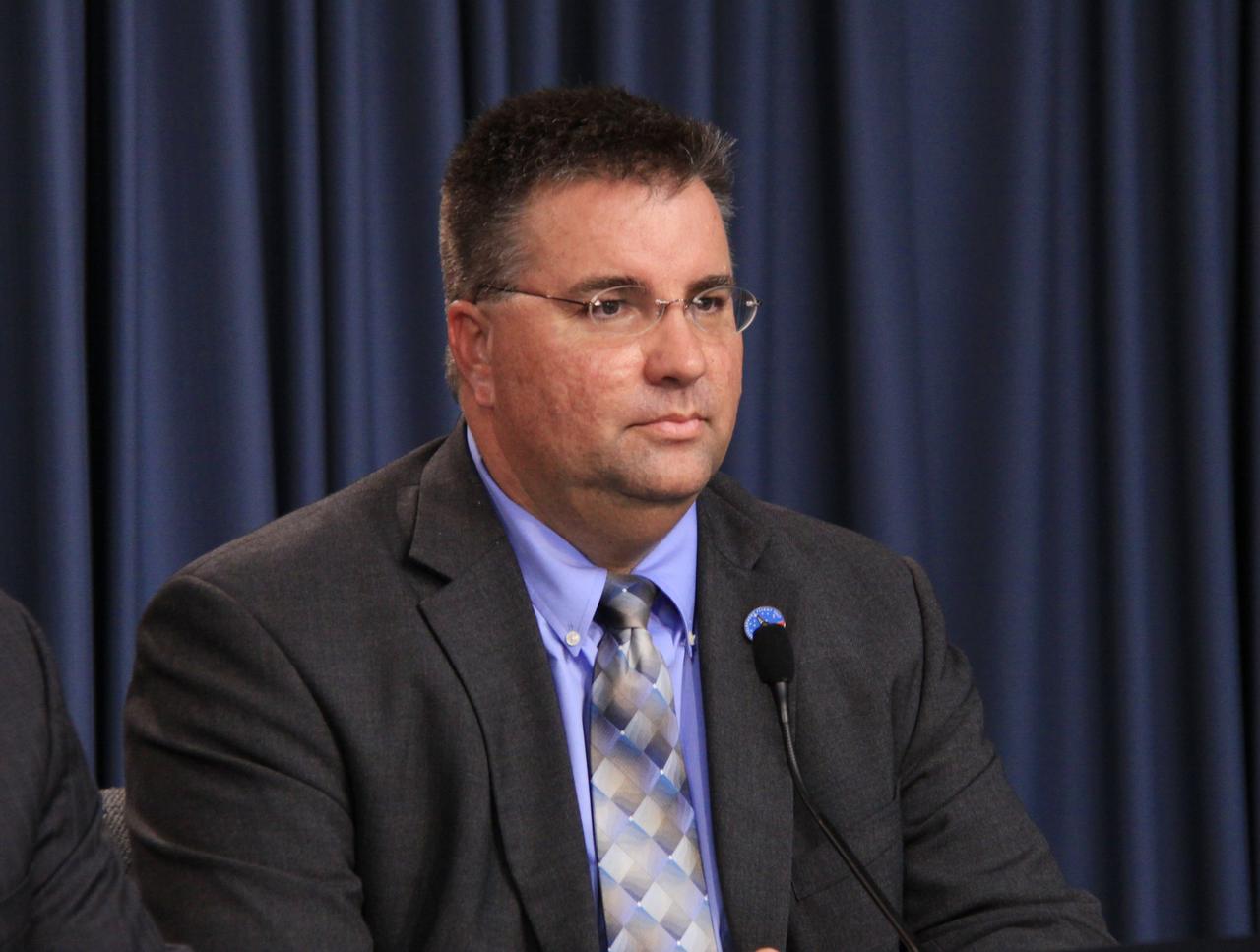 CAPE CANAVERAL, Fla. – In the Press Site auditorium at NASA's Kennedy Space Center in Florida, Edward Mango, launch director for the Ares I-X flight test, participates in a news conference following the conclusion of the flight test readiness review, or FTRR, for the Ares I-X test rocket.    During the meeting, senior NASA and contractor managers assessed the risks associated with the test and determined the rocket, support systems and procedures are ready for launch.  The Ares I-X launch date was announced after the FTRR and is officially set for Oct. 27.  For information on the Ares I-X vehicle and flight test, visit http://www.nasa.gov/aresIX.  Photo credit: NASA/Jack Pfaller