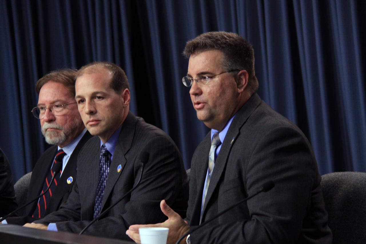 CAPE CANAVERAL, Fla. – At NASA's Kennedy Space Center in Florida, a news conference is held in the Press Site auditorium following the conclusion of the flight test readiness review, or FTRR, for the Ares I-X test rocket. From left are Doug Cooke, associate administrator for NASA's Exploration Systems Mission Directorate; Bob Ess, mission manager for the Ares I-X flight test; and Edward Mango, launch director for the Ares I-X flight test. During the meeting, senior NASA and contractor managers assessed the risks associated with the test and determined the rocket, support systems and procedures are ready for launch. The Ares I-X launch date was announced after the FTRR and is officially set for Oct. 27. For information on the Ares I-X vehicle and flight test, visit http://www.nasa.gov/aresIX. Photo credit: NASA/Jack Pfaller