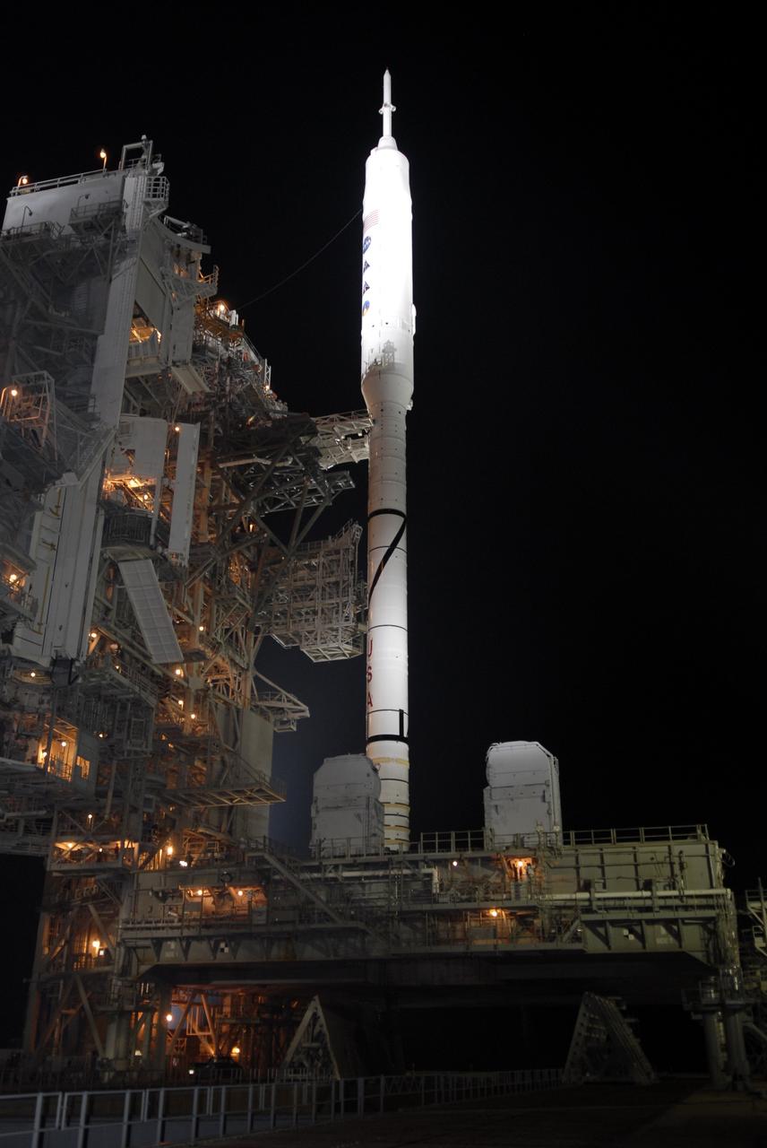 CAPE CANAVERAL, Fla. – At Launch Pad 39B at NASA's Kennedy Space Center in Florida, the rotating service structure has been rolled back from the Constellation Program's 327-foot-tall Ares I-X rocket, sitting atop its mobile launcher platform, during preparations for launch. The transfer of the pad from the Space Shuttle Program to the Constellation Program took place May 31. Modifications made to the pad include the removal of shuttle unique subsystems, such as the orbiter access arm and a section of the gaseous oxygen vent arm, and the installation of three 600-foot lightning towers, access platforms, environmental control systems and a vehicle stabilization system. The data returned from more than 700 sensors throughout the rocket will be used to refine the design of future launch vehicles and bring NASA one step closer to reaching its exploration goals. The Ares I-X flight test is targeted for Oct. 27. For information on the Ares I-X vehicle and flight test, visit http://www.nasa.gov/aresIX. Photo credit: NASA/Kim Shiflett