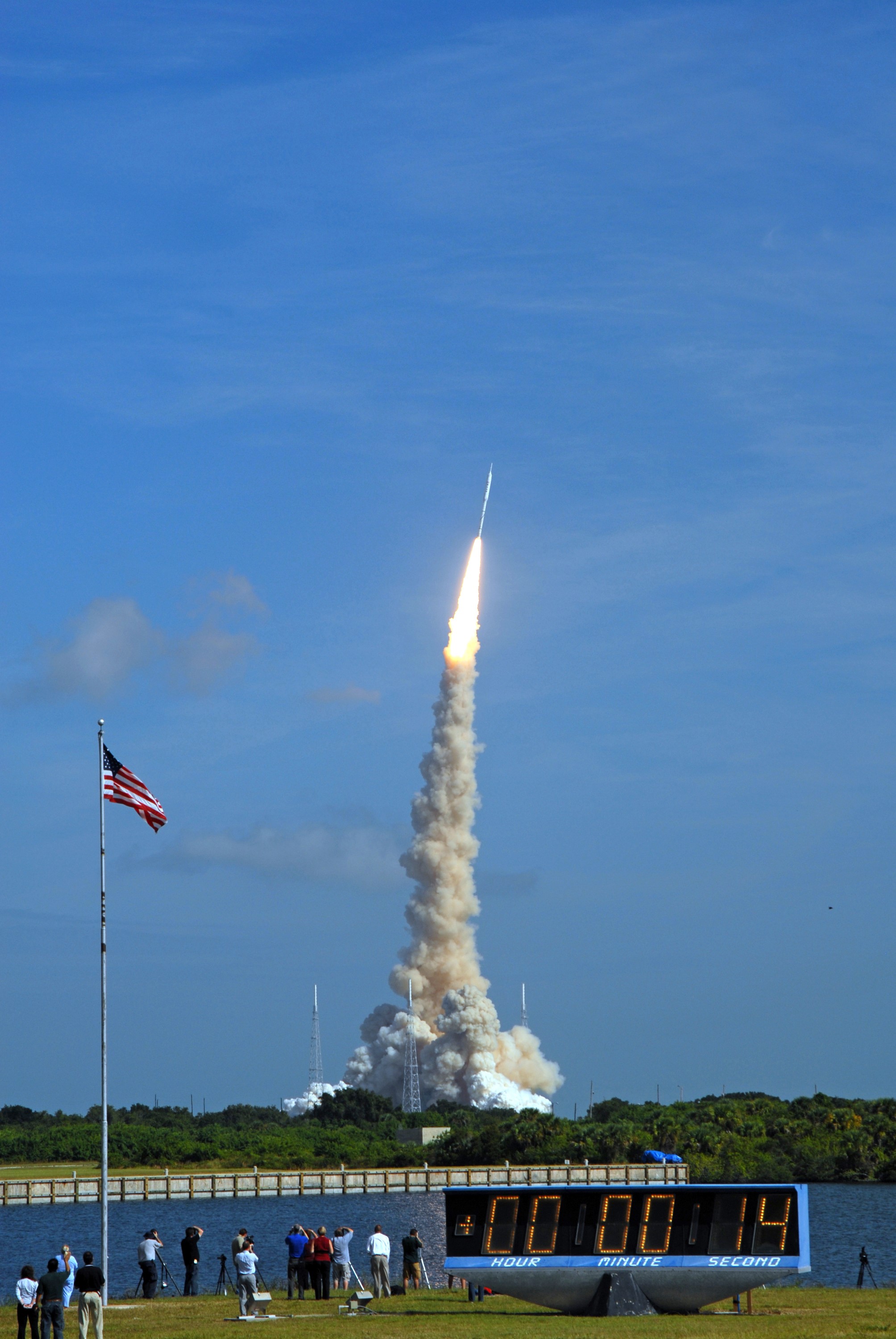 CAPE CANAVERAL, Fla. - At NASA's Kennedy Space Center in Florida, the Press Site countdown clock, so long a familiar a backdrop for space shuttle launches, counts off the seconds since liftoff from Launch Complex 39B of a new vehicle, the Constellation Program's Ares I-X test rocket.  The rocket produces 2.96 million pounds of thrust at liftoff and reaches a speed of 100 mph in eight seconds.    Liftoff of the 6-minute flight test was at 11:30 a.m. EDT Oct. 28. This was the first launch from Kennedy's pads of a vehicle other than the space shuttle since the Apollo Program's Saturn rockets were retired.  The parts used to make the Ares I-X booster flew on 30 different shuttle missions ranging from STS-29 in 1989 to STS-106 in 2000. The data returned from more than 700 sensors throughout the rocket will be used to refine the design of future launch vehicles and bring NASA one step closer to reaching its exploration goals.  For information on the Ares I-X vehicle and flight test, visit http://www.nasa.gov/aresIX.  Photo credit: NASA/Jim Grossmann