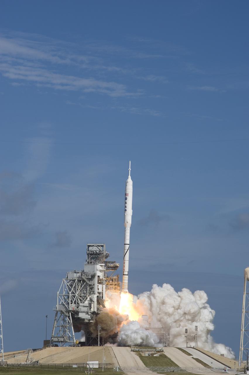 CAPE CANAVERAL, Fla. - Almost twice as tall as Disney's Cinderella Castle, the Constellation Program's 327-foot-tall Ares I-X test rocket races off Launch Complex 39B at NASA's Kennedy Space Center in Florida.  The rocket produces 2.96 million pounds of thrust at liftoff and reaches a speed of 100 mph in eight seconds.    Liftoff of the 6-minute flight test was at 11:30 a.m. EDT Oct. 28. This was the first launch from Kennedy's pads of a vehicle other than the space shuttle since the Apollo Program's Saturn rockets were retired.  The parts used to make the Ares I-X booster flew on 30 different shuttle missions ranging from STS-29 in 1989 to STS-106 in 2000. The data returned from more than 700 sensors throughout the rocket will be used to refine the design of future launch vehicles and bring NASA one step closer to reaching its exploration goals.  For information on the Ares I-X vehicle and flight test, visit http://www.nasa.gov/aresIX.  Photo credit: NASA/Sandra Joseph and Kevin O'Connell