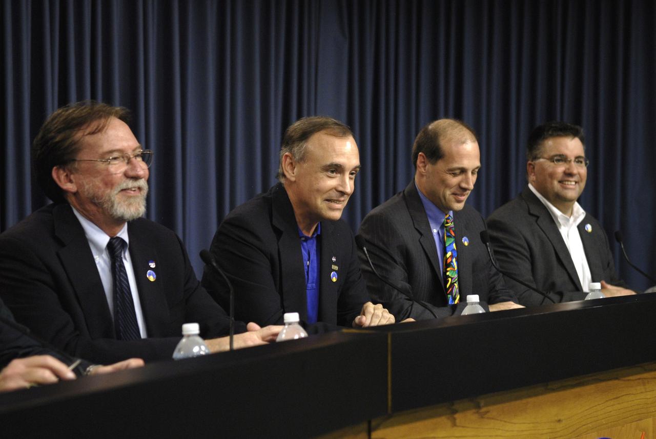 CAPE CANAVERAL, Fla. - At NASA's Kennedy Space Center in Florida, a post-launch news conference is held in the Press Site auditorium following the successful launch of the Ares I-X test rocket at 11:30 a.m. EDT Oct. 28. Smiling, from left, are Doug Cooke, associate administrator for NASA's Exploration Systems Mission Directorate; Jeff Hanley, Constellation Program manager; Bob Ess, mission manager for the Ares I-X flight test; and Edward Mango, launch director for the Ares I-X flight test. For more information on the Ares I-X vehicle and flight test, visit http://www.nasa.gov/aresIX. Photo credit: NASA/Kim Shiflett