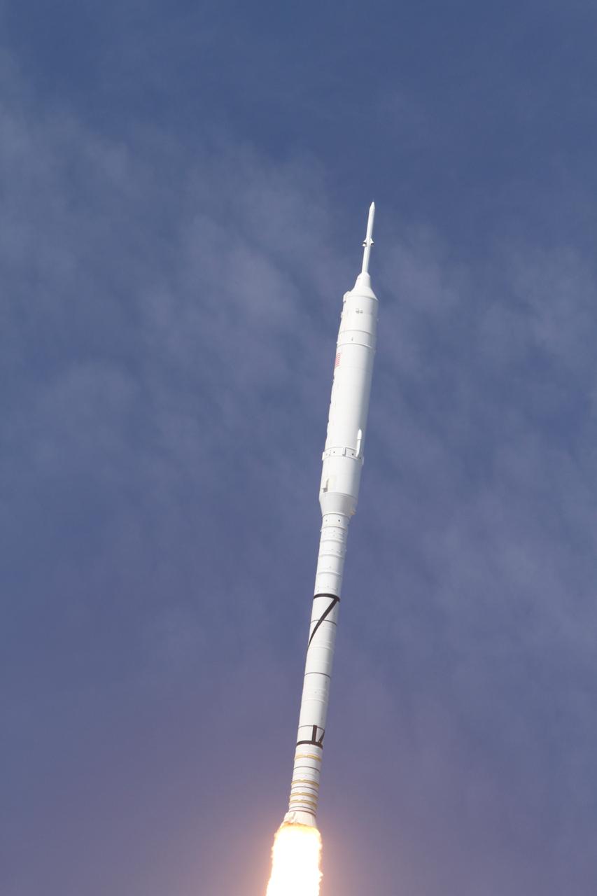 CAPE CANAVERAL, Fla. – The Ares I-X test rocket clears Launch Pad 39B at NASA's Kennedy Space Center in Florida at 11:30 a.m. EDT Oct. 28. Constellation Program's 327-foot-tall rocket produces 2.96 million pounds of thrust at liftoff and reaches a speed of 100 mph in eight seconds. This was the first launch from Kennedy's pads of a vehicle other than the space shuttle since the Apollo Program's Saturn rockets were retired. The parts used to make the Ares I-X booster flew on 30 different shuttle missions ranging from STS-29 in 1989 to STS-106 in 2000. The data returned from more than 700 sensors throughout the rocket will be used to refine the design of future launch vehicles and bring NASA one step closer to reaching its exploration goals. For information on the Ares I-X vehicle and flight test, visit http://www.nasa.gov/aresIX. Photo credit: NASA/ Kenny Allen