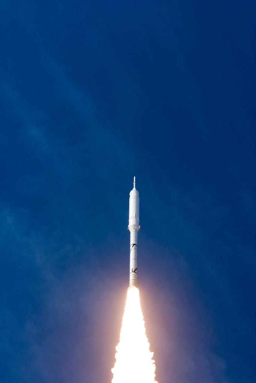 CAPE CANAVERAL, Fla. – The Ares I-X test rocket launches into a bright Florida sky from Launch Pad 39B at NASA's Kennedy Space Center in Florida at 11:30 a.m. EDT on Oct. 28. NASA’s Constellation Program's 327-foot-tall rocket produces 2.96 million pounds of thrust at liftoff and reaches a speed of 100 mph in eight seconds. This was the first launch from Kennedy's pads of a vehicle other than the space shuttle since the Apollo Program's Saturn rockets were retired. The parts used to make the Ares I-X booster flew on 30 different shuttle missions ranging from STS-29 in 1989 to STS-106 in 2000. The data returned from more than 700 sensors throughout the rocket will be used to refine the design of future launch vehicles and bring NASA one step closer to reaching its exploration goals. For information on the Ares I-X vehicle and flight test, visit http://www.nasa.gov/aresIX. Photo credit: NASA/George Roberts and Tom Farrar