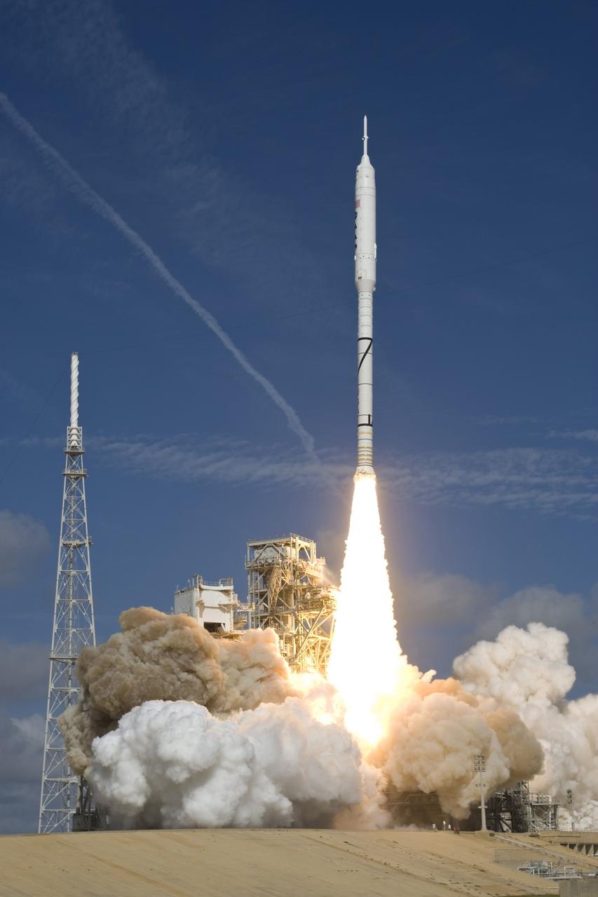 CAPE CANAVERAL, Fla. – NASA’s Ares I-X test rocket clears the tower at Launch Pad 39B at NASA's Kennedy Space Center in Florida at 11:30 a.m. EDT on Oct. 28. The rocket produces 2.96 million pounds of thrust at liftoff and reaches a speed of 100 mph in eight seconds. This was the first launch from Kennedy's pads of a vehicle other than the space shuttle since the Apollo Program's Saturn rockets were retired. The parts used to make the Ares I-X booster flew on 30 different shuttle missions ranging from STS-29 in 1989 to STS-106 in 2000. The data returned from more than 700 sensors throughout the rocket will be used to refine the design of future launch vehicles and bring NASA one step closer to reaching its exploration goals. For information on the Ares I-X vehicle and flight test, visit http://www.nasa.gov/aresIX. Photo credit: Courtesy of Scott Andrews