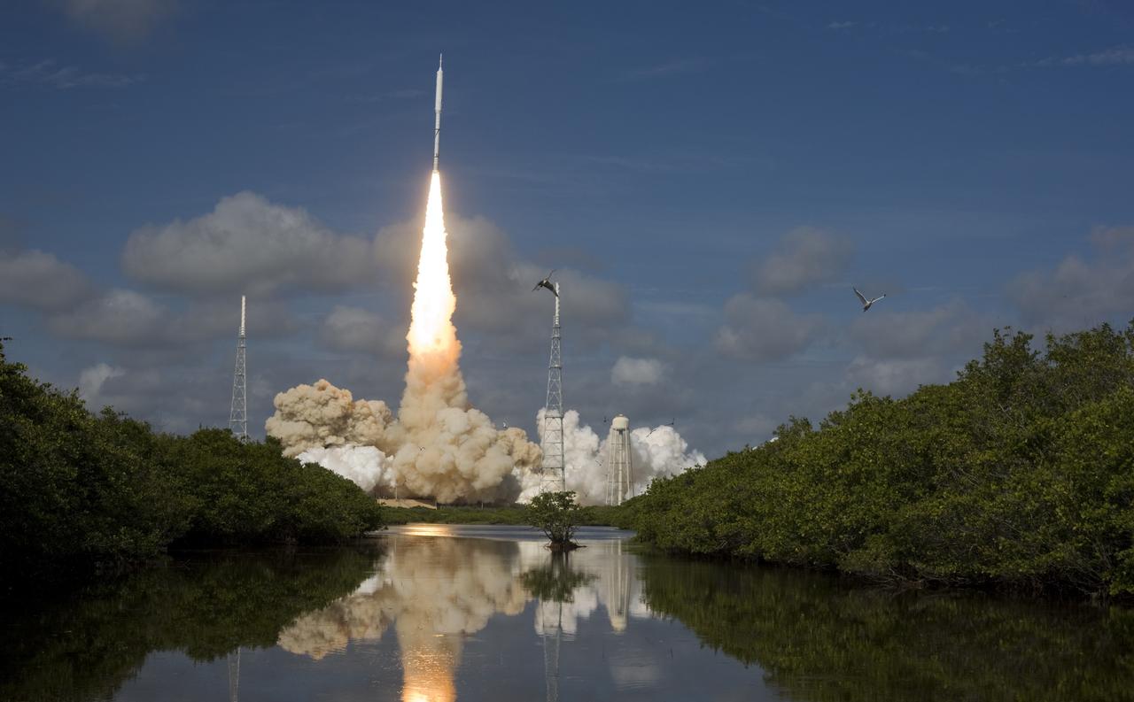 CAPE CANAVERAL, Fla. – NASA’s Ares I-X test rocket soars above Launch Pad 39B at NASA's Kennedy Space Center in Florida at 11:30 a.m. EDT on Oct. 28. The rocket produces 2.96 million pounds of thrust at liftoff and reaches a speed of 100 mph in eight seconds. This was the first launch from Kennedy's pads of a vehicle other than the space shuttle since the Apollo Program's Saturn rockets were retired. The parts used to make the Ares I-X booster flew on 30 different shuttle missions ranging from STS-29 in 1989 to STS-106 in 2000. The data returned from more than 700 sensors throughout the rocket will be used to refine the design of future launch vehicles and bring NASA one step closer to reaching its exploration goals. For information on the Ares I-X vehicle and flight test, visit http://www.nasa.gov/aresIX. Photo credit: Courtesy of Scott Andrews