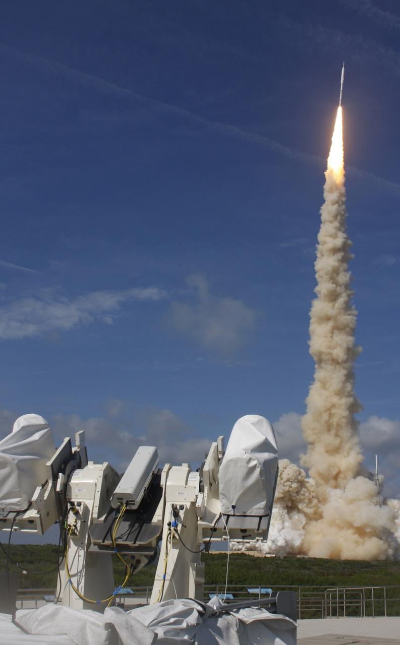 CAPE CANAVERAL, Fla. – NASA’s Ares I-X test rocket soars above Launch Pad 39B as tracking cameras record the liftoff at NASA's Kennedy Space Center in Florida at 11:30 a.m. EDT on Oct. 28. The rocket produces 2.96 million pounds of thrust at liftoff and reaches a speed of 100 mph in eight seconds. This was the first launch from Kennedy's pads of a vehicle other than the space shuttle since the Apollo Program's Saturn rockets were retired. The parts used to make the Ares I-X booster flew on 30 different shuttle missions ranging from STS-29 in 1989 to STS-106 in 2000. The data returned from more than 700 sensors throughout the rocket will be used to refine the design of future launch vehicles and bring NASA one step closer to reaching its exploration goals. For information on the Ares I-X vehicle and flight test, visit http://www.nasa.gov/aresIX. Photo credit: Courtesy of Scott Andrews