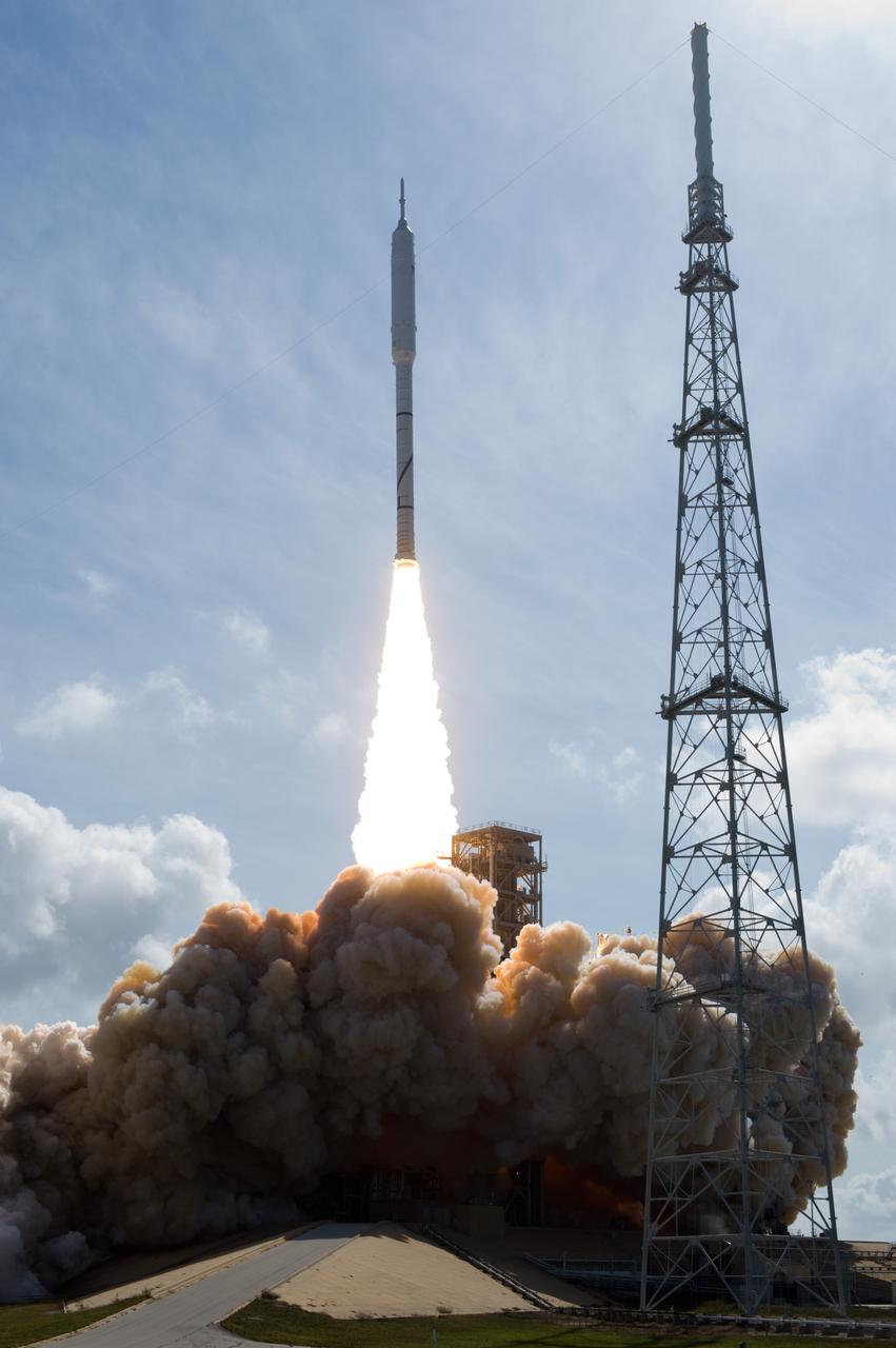 CAPE CANAVERAL, Fla. – NASA’s Ares I-X test rocket clears the tower at Launch Pad 39B at NASA's Kennedy Space Center in Florida at 11:30 a.m. EDT on Oct. 28. The rocket produces 2.96 million pounds of thrust at liftoff and reaches a speed of 100 mph in eight seconds. This was the first launch from Kennedy's pads of a vehicle other than the space shuttle since the Apollo Program's Saturn rockets were retired. The parts used to make the Ares I-X booster flew on 30 different shuttle missions ranging from STS-29 in 1989 to STS-106 in 2000. The data returned from more than 700 sensors throughout the rocket will be used to refine the design of future launch vehicles and bring NASA one step closer to reaching its exploration goals. For information on the Ares I-X vehicle and flight test, visit http://www.nasa.gov/aresIX. Photo credit: NASA/Tony Gray and Tom Farrar