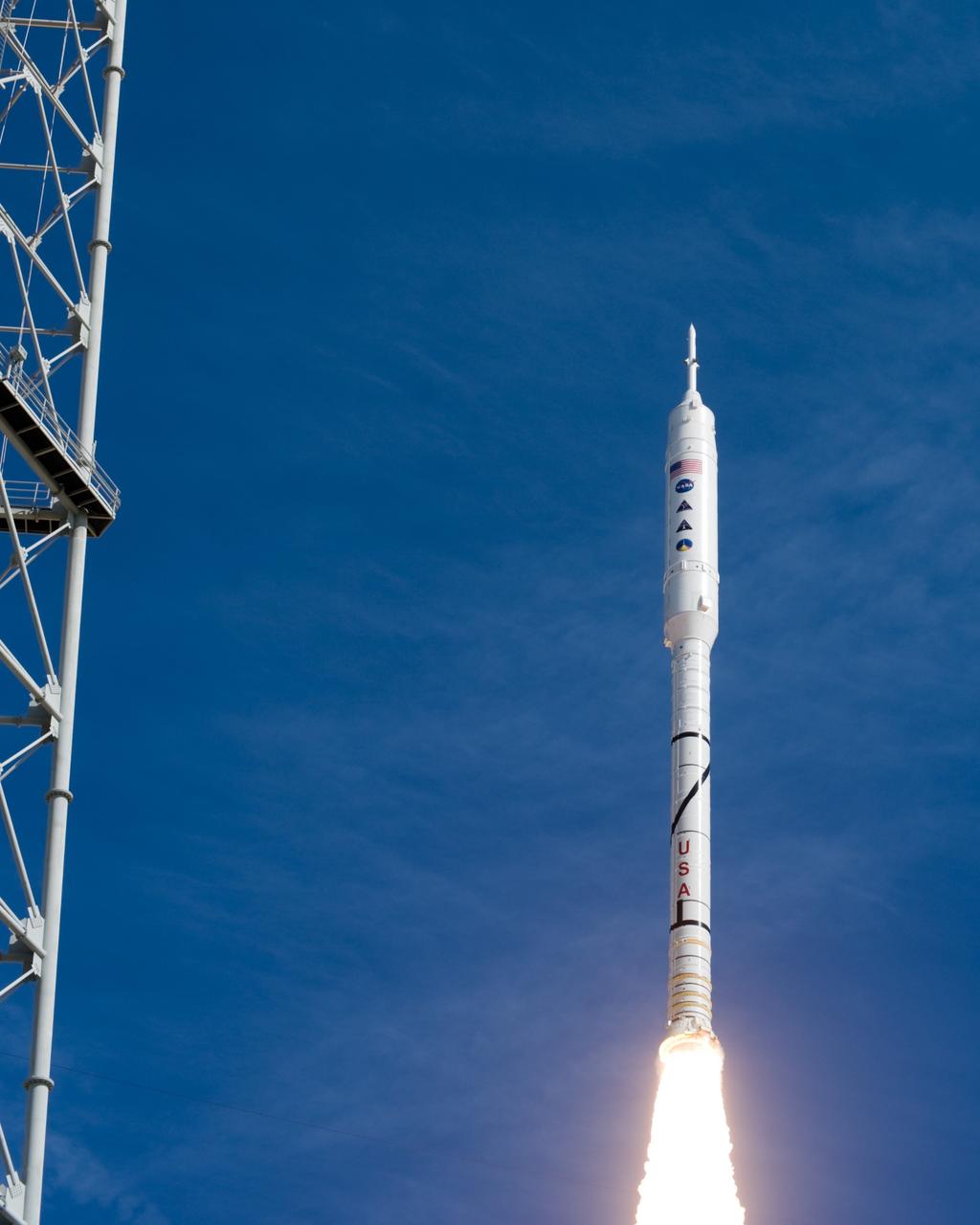 CAPE CANAVERAL, Fla. – NASA’s Ares I-X test rocket clears the tower at Launch Pad 39B at NASA's Kennedy Space Center in Florida at 11:30 a.m. EDT on Oct. 28. The rocket produces 2.96 million pounds of thrust at liftoff and reaches a speed of 100 mph in eight seconds. This was the first launch from Kennedy's pads of a vehicle other than the space shuttle since the Apollo Program's Saturn rockets were retired. The parts used to make the Ares I-X booster flew on 30 different shuttle missions ranging from STS-29 in 1989 to STS-106 in 2000. The data returned from more than 700 sensors throughout the rocket will be used to refine the design of future launch vehicles and bring NASA one step closer to reaching its exploration goals. For information on the Ares I-X vehicle and flight test, visit http://www.nasa.gov/aresIX. Photo credit: NASA/Tony Gray and Tom Farrar