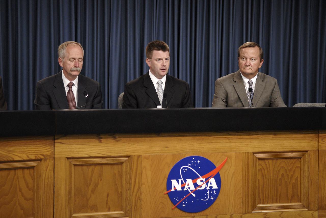 CAPE CANAVERAL, Fla. – In the Press Site auditorium at NASA's Kennedy Space Center in Florida, NASA managers brief the media about the Flight Readiness Review for STS-129. From left are Associate Administrator for NASA Space Operations Bill Gerstenmaier, Mission Management Team Chair Mike Moses and Shuttle Launch Director Mike Leinbach. The session confirmed a Nov. 16 launch date for space shuttle Atlantis is to fly the resupply mission to the International Space Station. Photo credit: NASA/Kim Shiflett.