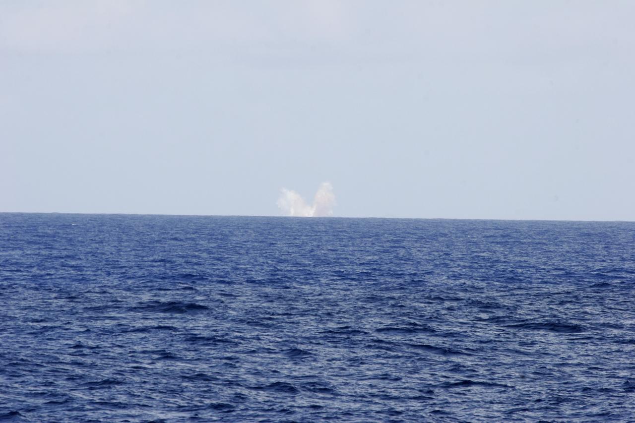 CAPE CANAVERAL, Fla. – The upper stage of the Ares I-X rocket falls into the Atlantic Ocean off the coast of NASA's Kennedy Space Center in Florida approximately 12 to 15 miles from the solid rocket booster recovery ship Freedom Star following the launch of the flight test mission.    Liftoff of the 6-minute flight test was at 11:30 a.m. EDT Oct. 28. This was the first launch from Kennedy's pads of a vehicle other than the space shuttle since the Apollo Program's Saturn rockets were retired.  The parts used to make the Ares I-X booster flew on 30 different shuttle missions ranging from STS-29 in 1989 to STS-106 in 2000. The data returned from more than 700 sensors throughout the rocket will be used to refine the design of future launch vehicles and bring NASA one step closer to reaching its exploration goals.  For information on the Ares I-X vehicle and flight test, visit http://www.nasa.gov/aresIX.  Photo credit: United Space Alliance