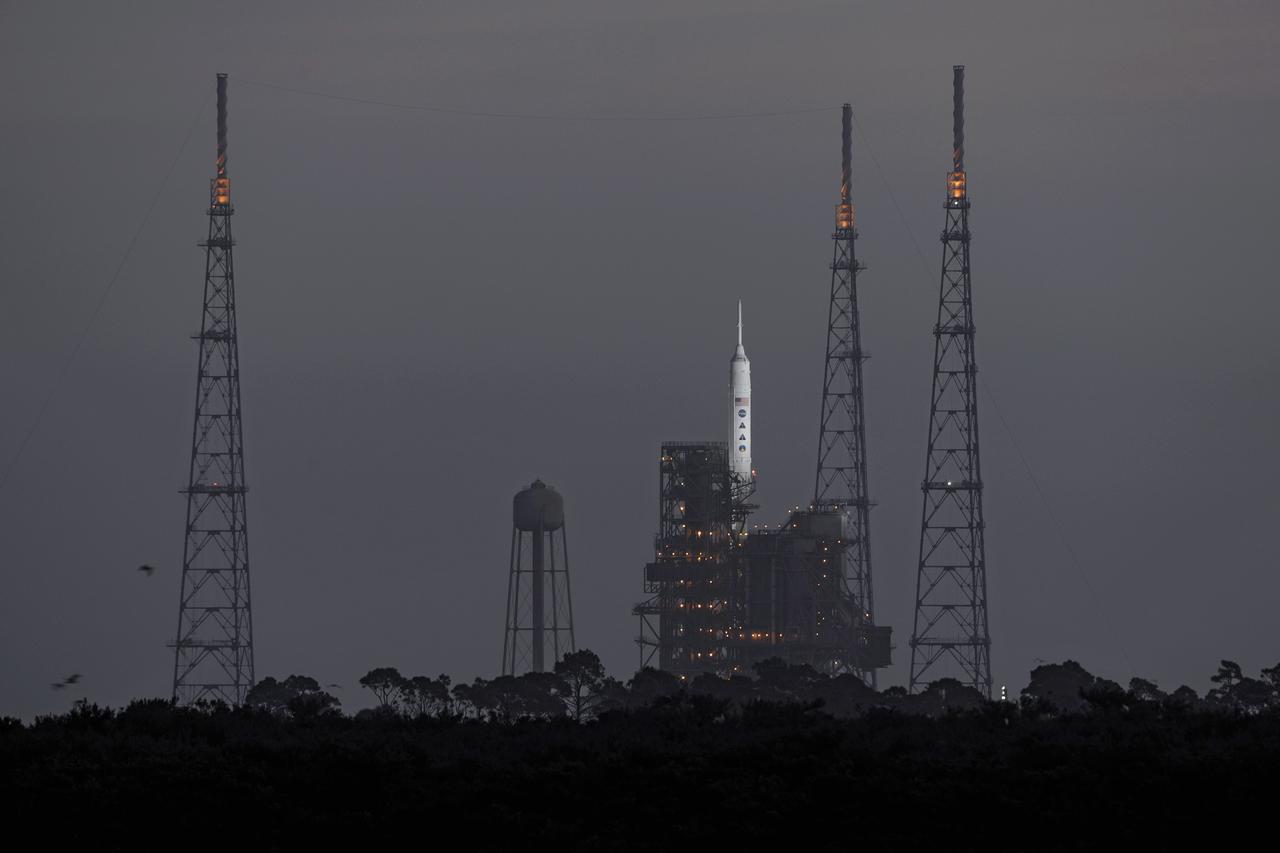 CAPE CANAVERAL, Fla. - Before daybreak at NASA's Kennedy Space Center in Florida, final preparations are under way at Launch Pad 39B for the launch of NASA’s Ares I-X test rocket.    This will be the first launch from Kennedy's pads of a vehicle other than the space shuttle since the Apollo Program's Saturn rockets were retired.  The parts used to make the Ares I-X booster flew on 30 different shuttle missions ranging from STS-29 in 1989 to STS-106 in 2000. The data returned from more than 700 sensors throughout the rocket will be used to refine the design of future launch vehicles and bring NASA one step closer to reaching its exploration goals.  For information on the Ares I-X vehicle and flight test, visit http://www.nasa.gov/aresIX.  Photo credit: NASA/Carl Winebarger
