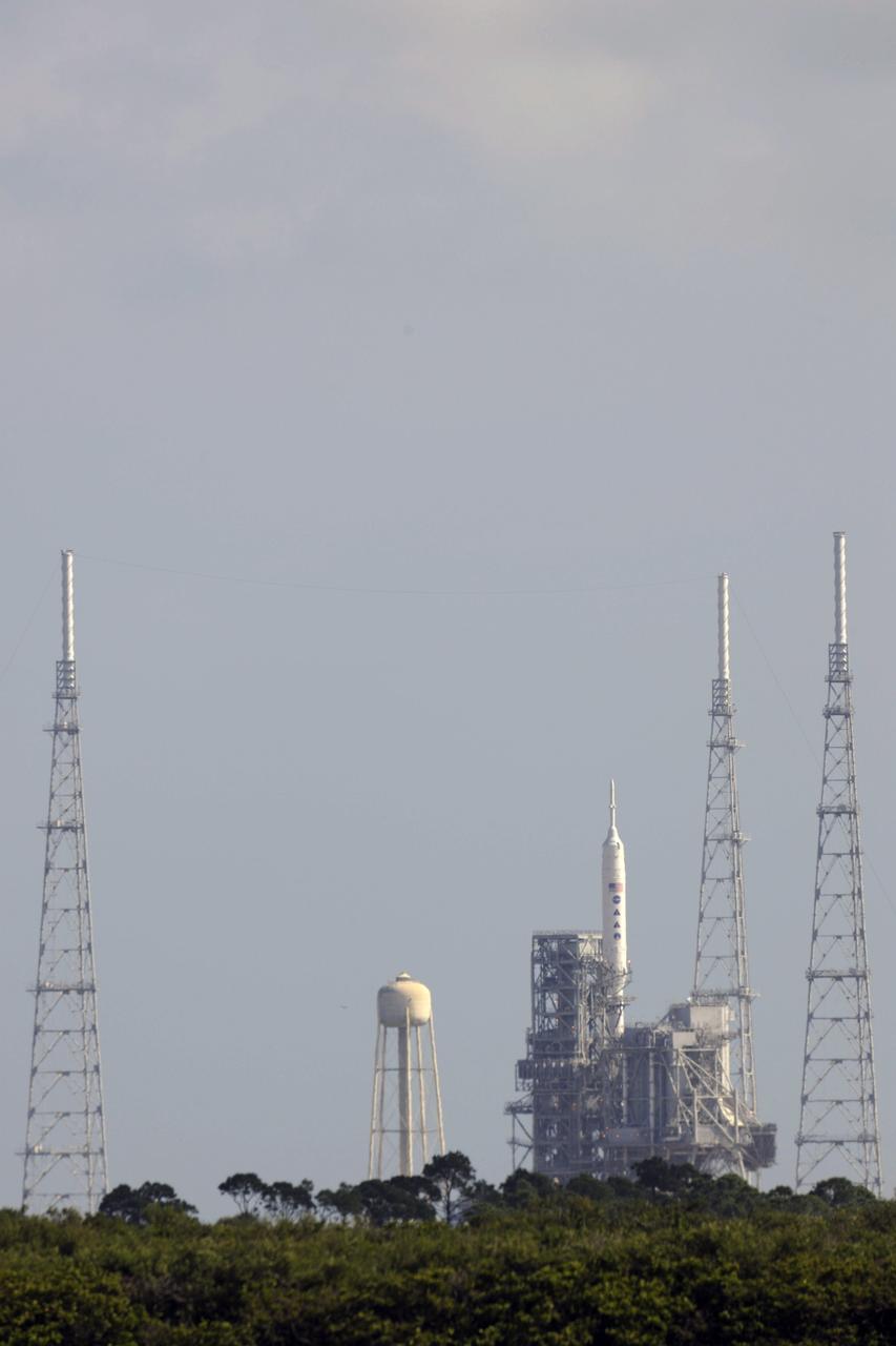 CAPE CANAVERAL, Fla. - As the sun rises over NASA's Kennedy Space Center in Florida, final preparations are under way at Launch Pad 39B for the launch of NASA’s Ares I-X test rocket.    This will be the first launch from Kennedy's pads of a vehicle other than the space shuttle since the Apollo Program's Saturn rockets were retired.  The parts used to make the Ares I-X booster flew on 30 different shuttle missions ranging from STS-29 in 1989 to STS-106 in 2000. The data returned from more than 700 sensors throughout the rocket will be used to refine the design of future launch vehicles and bring NASA one step closer to reaching its exploration goals.  For information on the Ares I-X vehicle and flight test, visit http://www.nasa.gov/aresIX.  Photo credit: NASA/Carl Winebarger
