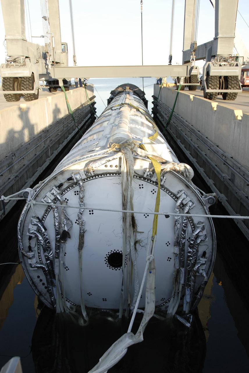 CAPE CANAVERAL, Fla. – At Hangar AF on Cape Canaveral Air Force Station in Florida, the spent first stage of NASA's Ares I-X rocket is secured in a slip.  The solid rocket booster recovery ship Freedom Star recovered the booster after it splashed down in the Atlantic Ocean following its flight test.     Liftoff of the 6-minute flight test was at 11:30 a.m. EDT Oct. 28. This was the first launch from Kennedy's pads of a vehicle other than the space shuttle since the Apollo Program's Saturn rockets were retired.  The parts used to make the Ares I-X booster flew on 30 different shuttle missions ranging from STS-29 in 1989 to STS-106 in 2000. The data returned from more than 700 sensors throughout the rocket will be used to refine the design of future launch vehicles and bring NASA one step closer to reaching its exploration goals.  For information on the Ares I-X vehicle and flight test, visit http://www.nasa.gov/aresIX.  Photo credit: NASA/Kim Shiflett