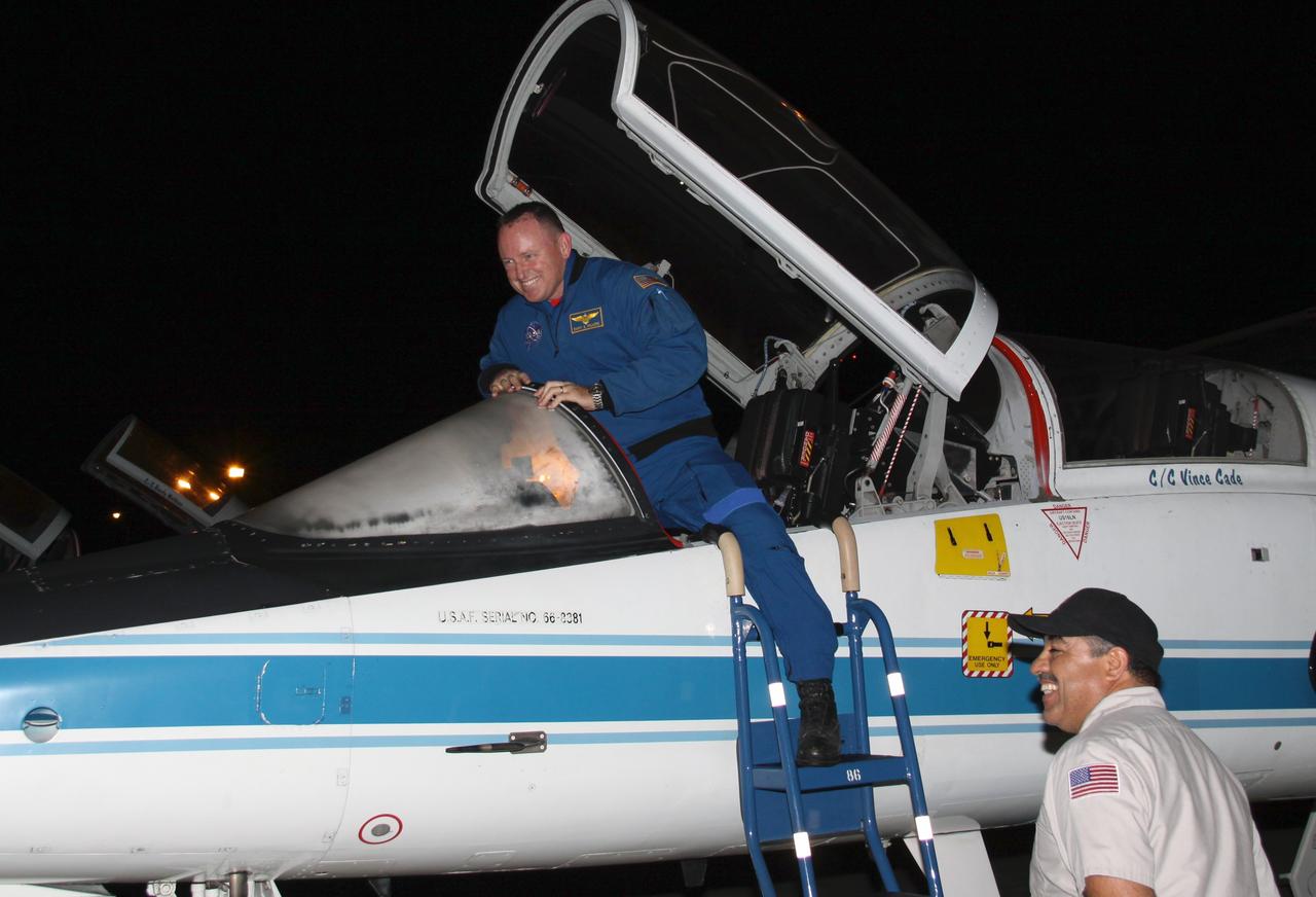 CAPE CANAVERAL, Fla. - STS-129 Pilot Barry E. Wilmore arrives at the Shuttle Landing Facility at NASA's Kennedy Space Center in Florida aboard a T-38 jet.  The six astronauts for space shuttle Atlantis’ STS-129 mission are at Kennedy for their launch dress rehearsal, the Terminal Countdown Demonstration Test.    Additional training associated with the test was done last month, but the simulated countdown was postponed because of a scheduling conflict with the launch of NASA’s Ares I-X test rocket.  Launch of Atlantis on its STS-129 mission to the International Space Station is set for Nov. 16. On STS-129, the crew will deliver to the station two spare gyroscopes, two nitrogen tank assemblies, two pump modules, an ammonia tank assembly and a spare latching end effector for the station's robotic arm.  For information on the STS-129 mission objectives and crew, visit http://www.nasa.gov/mission_pages/shuttle/shuttlemissions/sts129/index.html. Photo credit: NASA/Troy Cryder