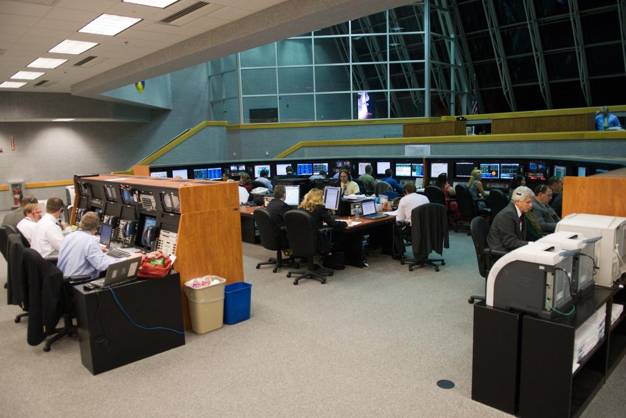 CAPE CANAVERAL, Fla. - The prime launch team for the Ares I-X flight test monitors the countdown from consoles in the Young-Crippen Firing Room in the Launch Control Center at NASA's Kennedy Space Center in Florida.    This will be the first launch from Kennedy's pads of a vehicle other than the space shuttle since the Apollo Program's Saturn rockets were retired.  The parts used to make the Ares I-X booster flew on 30 different shuttle missions ranging from STS-29 in 1989 to STS-106 in 2000. The data returned from more than 700 sensors throughout the rocket will be used to refine the design of future launch vehicles and bring NASA one step closer to reaching its exploration goals.  For information on the Ares I-X vehicle and flight test, visit http://www.nasa.gov/aresIX.  Photo credit: NASA/Kim Shiflett