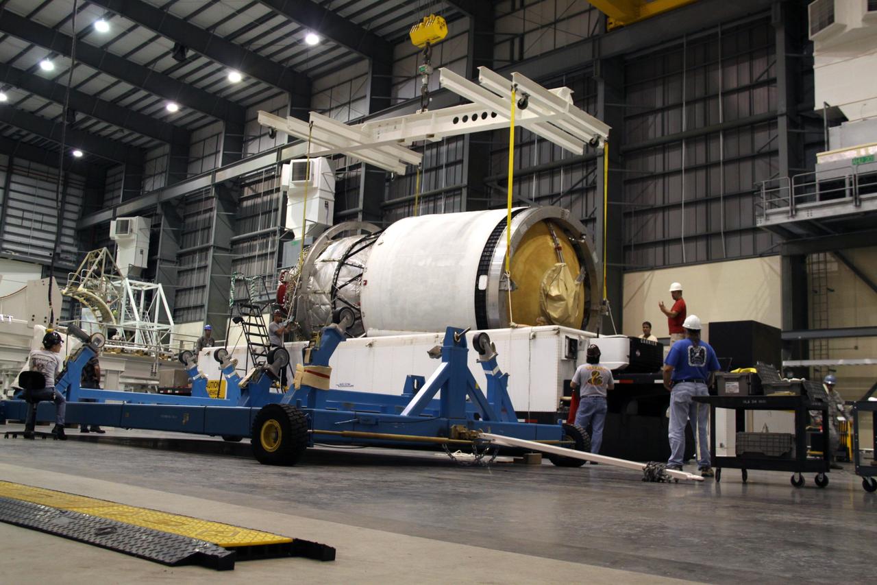 CAPE CANAVERAL, Fla. – Vigilant workers monitor the second stage of a Delta IV as it is lifted from its transporter by crane in the Horizontal Integration Facility at Launch Complex 37 on Cape Canaveral Air Force Station in Florida.    This United Launch Alliance Delta IV rocket is the vehicle slated to launch GOES-P, the latest Geostationary Operational Environmental Satellite developed by NASA for the National Oceanic and Atmospheric Administration, or NOAA. Processing of the Delta IV is on track for launch, targeted for March 4, 2010.  For information on GOES-P, visit http://goespoes.gsfc.nasa.gov/goes/spacecraft/n_p_spacecraft.html. Photo credit: NASA/Jack Pfaller