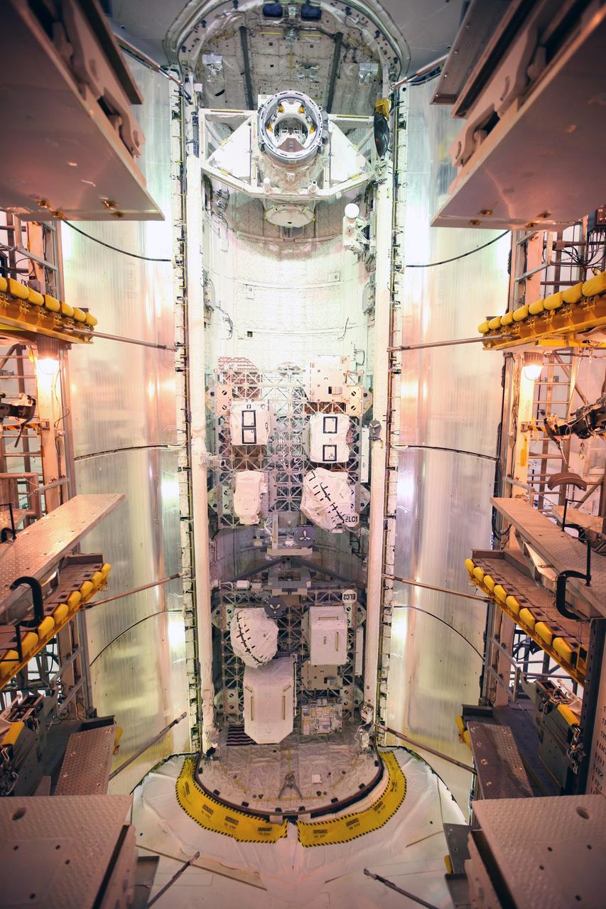 CAPE CANAVERAL, Fla. - At Launch Pad 39A at NASA's Kennedy Space Center in Florida, space shuttle Atlantis' payload bay doors are ready to be closed around the cargo for Atlantis' STS-129 mission to the International Space Station.  The cargo includes the Express Logistics Carriers 1 and 2.    The STS-129 crew will deliver two spare gyroscopes, two nitrogen tank assemblies, two pump modules, an ammonia tank assembly and a spare latching end effector for the station's robotic arm.  Launch is set for Nov. 16. For information on the STS-129 mission, visit http://www.nasa.gov/mission_pages/shuttle/shuttlemissions/sts129/index.html. Photo credit: NASA/Troy Cryder