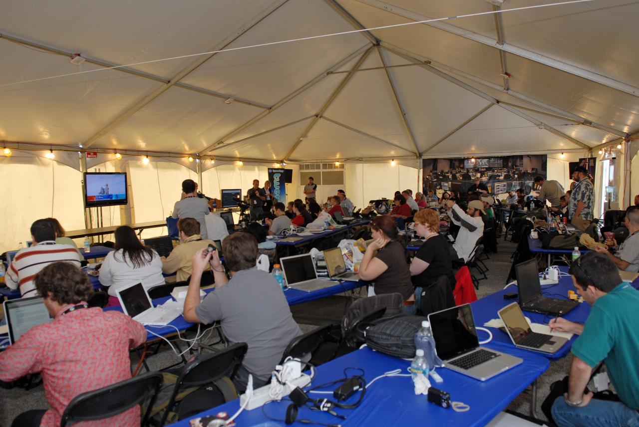 CAPE CANAVERAL, Fla. - At the NASA Press Site at NASA's Kennedy Space Center in Florida, Twitter followers participate in a unique event, a Tweetup, held to share the excitement of a space shuttle launch with a new audience. The two-day event will provide NASA Twitter followers the opportunity to take a tour of Kennedy, view a shuttle launch and speak with shuttle technicians, engineers, astronauts and managers, as well as the staff behind the tweets on @NASA. Launch of shuttle Atlantis on the STS-129 mission to the International Space Station is scheduled for 2:28 p.m. EST on Nov. 16. For information on the STS-129 mission and crew, visit http://www.nasa.gov/mission_pages/shuttle/shuttlemissions/sts129/index.html. Photo credit: NASA/Jim Grossmann