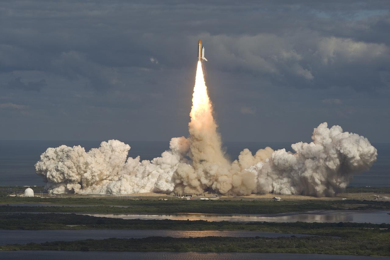 CAPE CANAVERAL, Fla. - Like a phoenix rising from the flames, space shuttle Atlantis takes flight from Launch Pad 39A at NASA's Kennedy Space Center in Florida.    Liftoff on its STS-129 mission came at 2:28 p.m. EST Nov. 16.  Aboard are crew members Commander Charles O. Hobaugh; Pilot Barry E. Wilmore; and Mission Specialists Leland Melvin, Randy Bresnik, Mike Foreman and Robert L. Satcher Jr.  On STS-129, the crew will deliver two ExPRESS Logistics Carriers to the International Space Station, the largest of the shuttle's cargo carriers, containing 15 spare pieces of equipment including two gyroscopes, two nitrogen tank assemblies, two pump modules, an ammonia tank assembly and a spare latching end effector for the station's robotic arm.  Atlantis will return to Earth a station crew member, Nicole Stott, who has spent more than two months aboard the orbiting laboratory.  STS-129 is slated to be the final space shuttle Expedition crew rotation flight. For information on the STS-129 mission and crew, visit http://www.nasa.gov/mission_pages/shuttle/shuttlemissions/sts129/index.html.    Photo courtesy of Scott Andrews