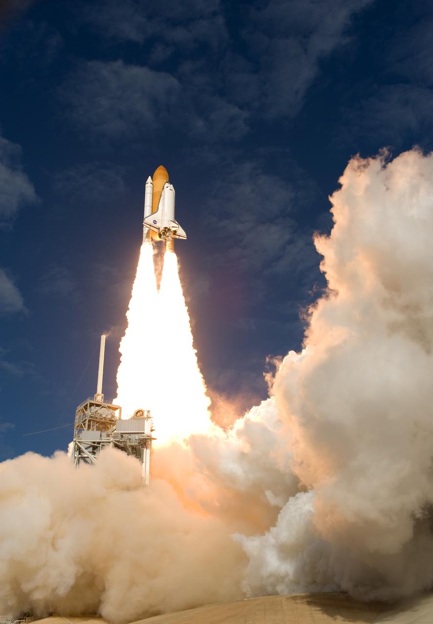 CAPE CANAVERAL, Fla. - Like a phoenix rising from the flames, space shuttle Atlantis emerges from the exhaust cloud building on Launch Pad 39A at NASA's Kennedy Space Center in Florida.    Liftoff on its STS-129 mission came at 2:28 p.m. EST Nov. 16.  Aboard are crew members Commander Charles O. Hobaugh; Pilot Barry E. Wilmore; and Mission Specialists Leland Melvin, Randy Bresnik, Mike Foreman and Robert L. Satcher Jr.  On STS-129, the crew will deliver two ExPRESS Logistics Carriers to the International Space Station, the largest of the shuttle's cargo carriers, containing 15 spare pieces of equipment including two gyroscopes, two nitrogen tank assemblies, two pump modules, an ammonia tank assembly and a spare latching end effector for the station's robotic arm.  Atlantis will return to Earth a station crew member, Nicole Stott, who has spent more than two months aboard the orbiting laboratory.  STS-129 is slated to be the final space shuttle Expedition crew rotation flight. For information on the STS-129 mission and crew, visit http://www.nasa.gov/mission_pages/shuttle/shuttlemissions/sts129/index.html.    Photo credit: NASA/Tom Farrar and Tony Gray