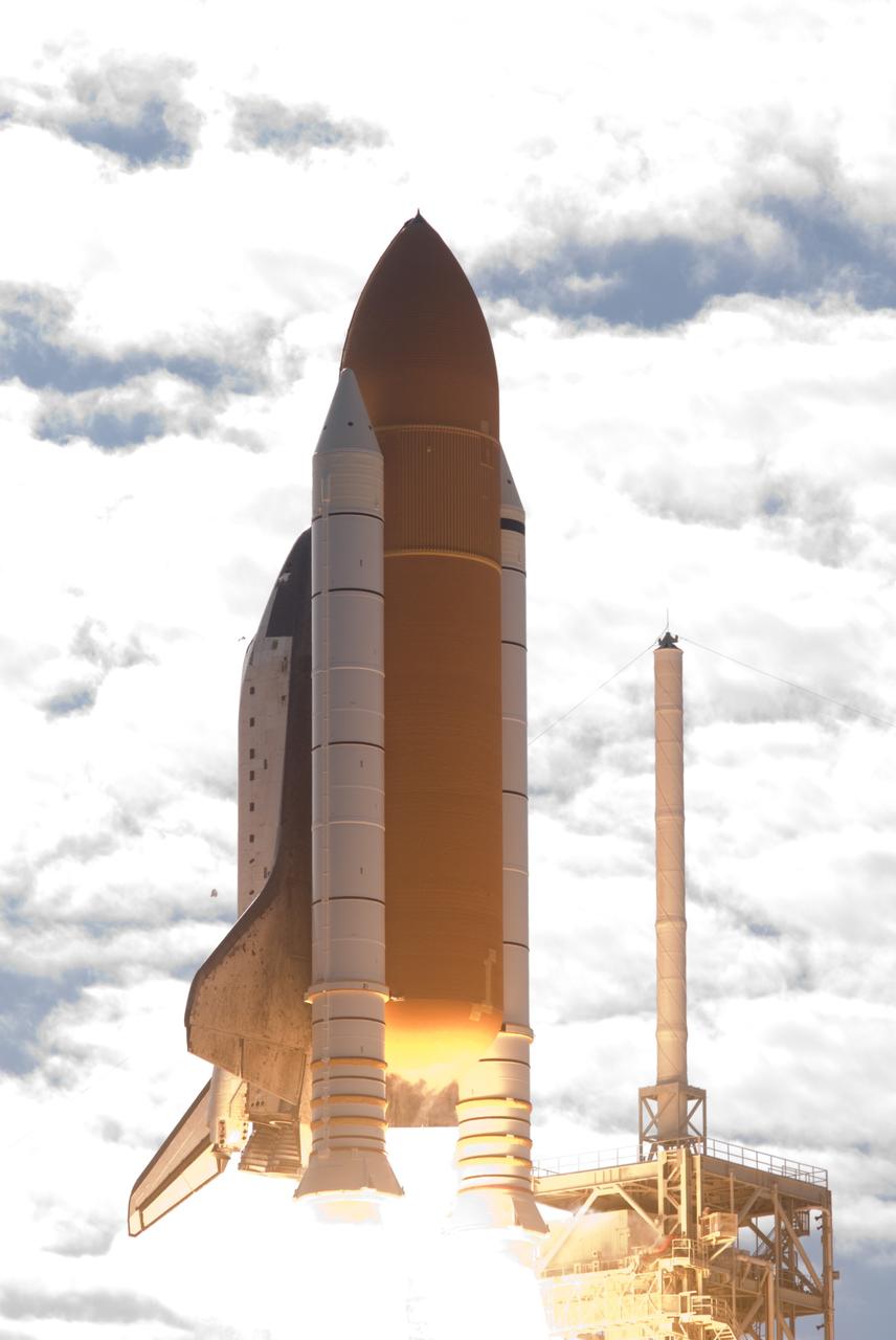 CAPE CANAVERAL, Fla. - With nearly 7 million pounds of thrust generated by twin solid rocket boosters and three main engines, space shuttle Atlantis clears the tower on Launch Pad 39A at NASA's Kennedy Space Center in Florida.     Liftoff on its STS-129 mission came at 2:28 p.m. EST Nov. 16.  Aboard are crew members Commander Charles O. Hobaugh; Pilot Barry E. Wilmore; and Mission Specialists Leland Melvin, Randy Bresnik, Mike Foreman and Robert L. Satcher Jr.  On STS-129, the crew will deliver two ExPRESS Logistics Carriers to the International Space Station, the largest of the shuttle's cargo carriers, containing 15 spare pieces of equipment including two gyroscopes, two nitrogen tank assemblies, two pump modules, an ammonia tank assembly and a spare latching end effector for the station's robotic arm.  Atlantis will return to Earth a station crew member, Nicole Stott, who has spent more than two months aboard the orbiting laboratory.  STS-129 is slated to be the final space shuttle Expedition crew rotation flight. For information on the STS-129 mission and crew, visit http://www.nasa.gov/mission_pages/shuttle/shuttlemissions/sts129/index.html.    Photo credit: NASA/Rusty Backer