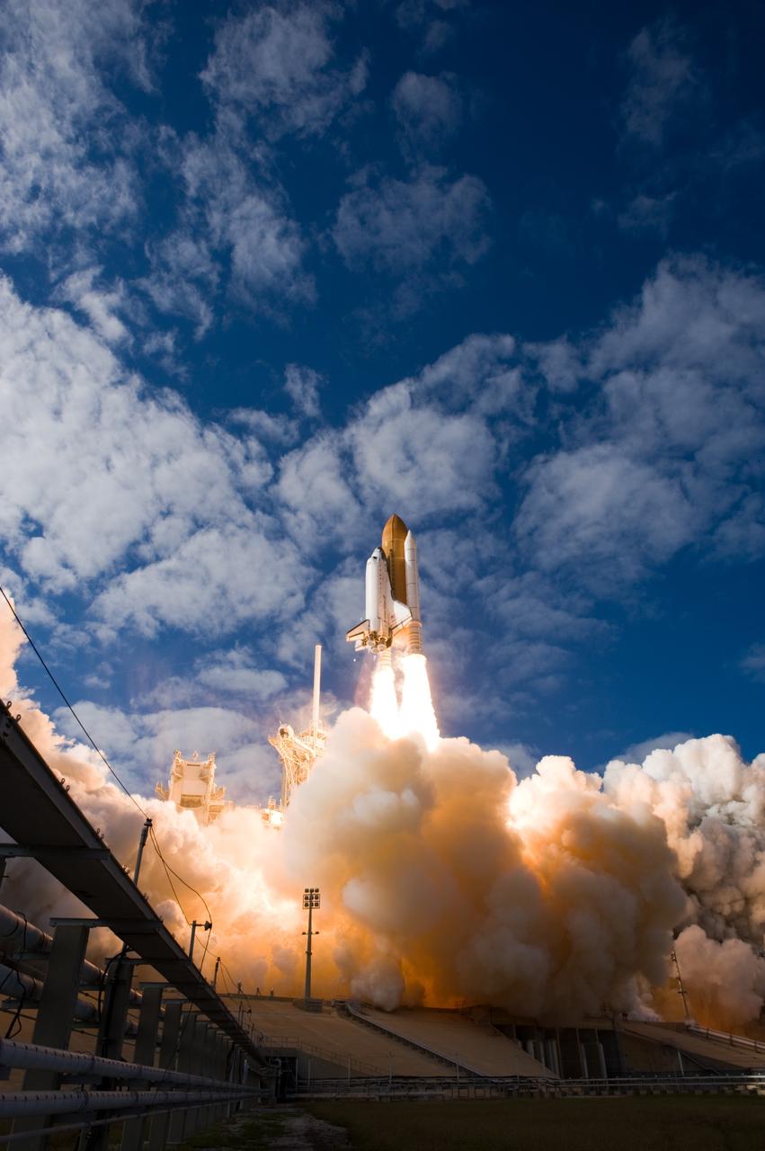 CAPE CANAVERAL, Fla. - With nearly 7 million pounds of thrust generated by twin solid rocket boosters and three main engines, space shuttle Atlantis clears the tower on Launch Pad 39A at NASA's Kennedy Space Center in Florida.     Liftoff on its STS-129 mission came at 2:28 p.m. EST Nov. 16.  Aboard are crew members Commander Charles O. Hobaugh; Pilot Barry E. Wilmore; and Mission Specialists Leland Melvin, Randy Bresnik, Mike Foreman and Robert L. Satcher Jr.  On STS-129, the crew will deliver two ExPRESS Logistics Carriers to the International Space Station, the largest of the shuttle's cargo carriers, containing 15 spare pieces of equipment including two gyroscopes, two nitrogen tank assemblies, two pump modules, an ammonia tank assembly and a spare latching end effector for the station's robotic arm.  Atlantis will return to Earth a station crew member, Nicole Stott, who has spent more than two months aboard the orbiting laboratory.  STS-129 is slated to be the final space shuttle Expedition crew rotation flight. For information on the STS-129 mission and crew, visit http://www.nasa.gov/mission_pages/shuttle/shuttlemissions/sts129/index.html.    Photo credit: NASA/Tom Farrar and Tony Gray