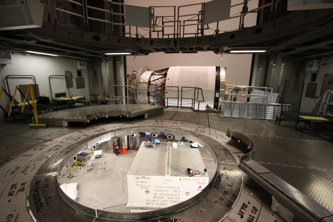 CAPE CANAVERAL, Fla. – The second stage of a Delta IV rocket is prepared for hoisting into a test cell to begin checkout in the hangar of the Delta Operations Center at Cape Canaveral Air Force Station in Florida. The United Launch Alliance Delta IV rocket is the vehicle slated to launch GOES-P, the latest Geostationary Operational Environmental Satellite developed by NASA for the National Oceanic and Atmospheric Administration, or NOAA. A meteorological satellite, GOES-P is designed to watch for storm development and observed current weather conditions on Earth. Launch of GOES-P is scheduled for no earlier than Feb. 25, 2010, from Launch Complex 37. For information on GOES-P, visit http://goespoes.gsfc.nasa.gov/goes/spacecraft/n_p_spacecraft.html. Photo credit: NASA/Troy Cryder