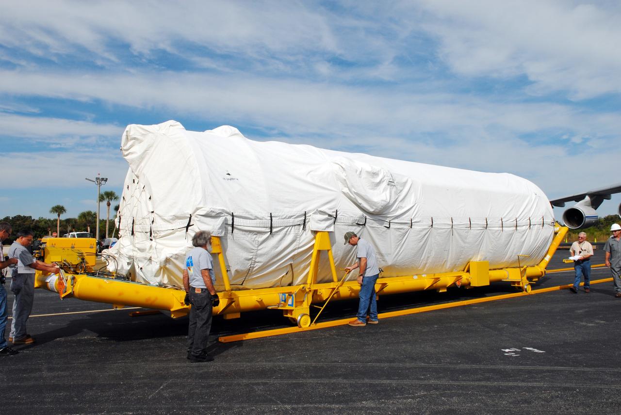 CAPE CANAVERAL, Fla. – At the Skid Strip on Cape Canaveral Air Force Station in Florida, the Centaur second stage for the Atlas V rocket slated to launch NASA's Solar Dynamics Observatory, or SDO, has been offloaded from Volga-Dnepr Antonov AN-124-100, a Ukranian/Russian aircraft, in which it was delivered.    SDO is the first space weather research network mission in NASA's Living With a Star Program. The spacecraft's long-term measurements will give solar scientists in-depth information about changes in the sun's magnetic field and insight into how they affect Earth. Liftoff on the United Launch Alliance Atlas V is scheduled for Feb. 3, 2010. For information on SDO, visit http://www.nasa.gov/sdo.  Photo credit: NASA/Jim Grossmann