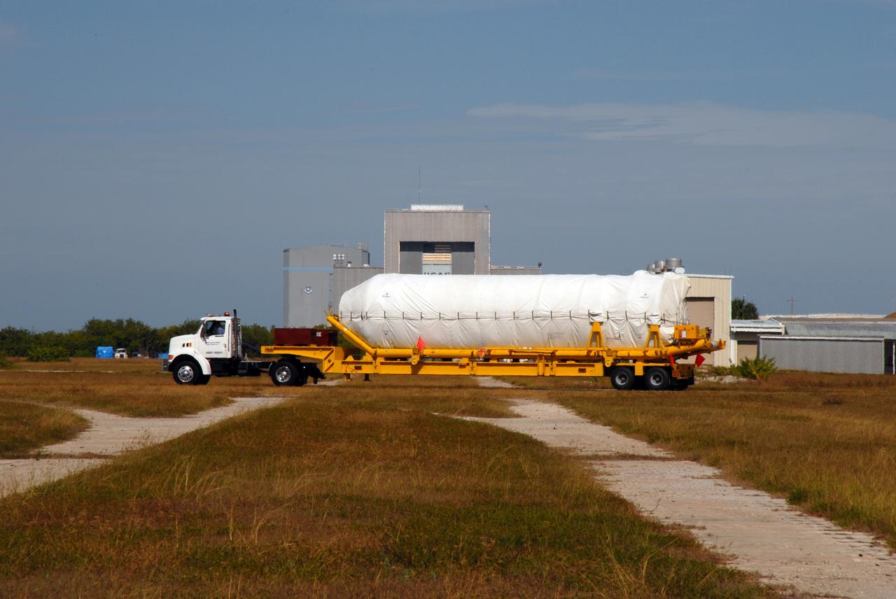 CAPE CANAVERAL, Fla. – The Centaur second stage for the Atlas V rocket slated to launch NASA's Solar Dynamics Observatory, or SDO, arrives at the Atlas Spaceflight Operations Center on Cape Canaveral Air Force Station in Florida.    SDO is the first space weather research network mission in NASA's Living With a Star Program. The spacecraft's long-term measurements will give solar scientists in-depth information about changes in the sun's magnetic field and insight into how they affect Earth. Liftoff on the United Launch Alliance Atlas V is scheduled for Feb. 3, 2010. For information on SDO, visit http://www.nasa.gov/sdo.  Photo credit: NASA/Jim Grossmann
