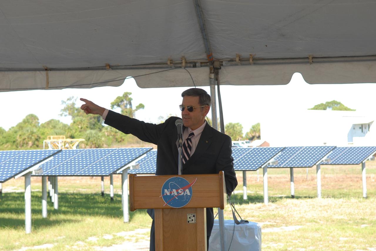 CAPE CANAVERAL, Fla. – NASA Kennedy Space Center Director Bob Cabana addresses the audience on hand for the unveiling of NASA's first large-scale solar power generation facility at Kennedy in Florida. Representatives from NASA, Florida Power & Light Company, or FPL, and SunPower Corporation formally commissioned the one-megawatt facility and announced plans to pursue a new research, development and demonstration project at Kennedy to advance America's use of renewable energy. The facility is the first element of a major renewable energy project currently under construction at Kennedy. The completed system features a fixed-tilt, ground-mounted solar power system designed and built by SunPower, along with SunPower solar panels. A 10-megawatt solar farm, which SunPower is building on nearby Kennedy property, will supply power to FPL's customers when it is completed in April 2010. Photo credit: NASA/Jim Grossmann