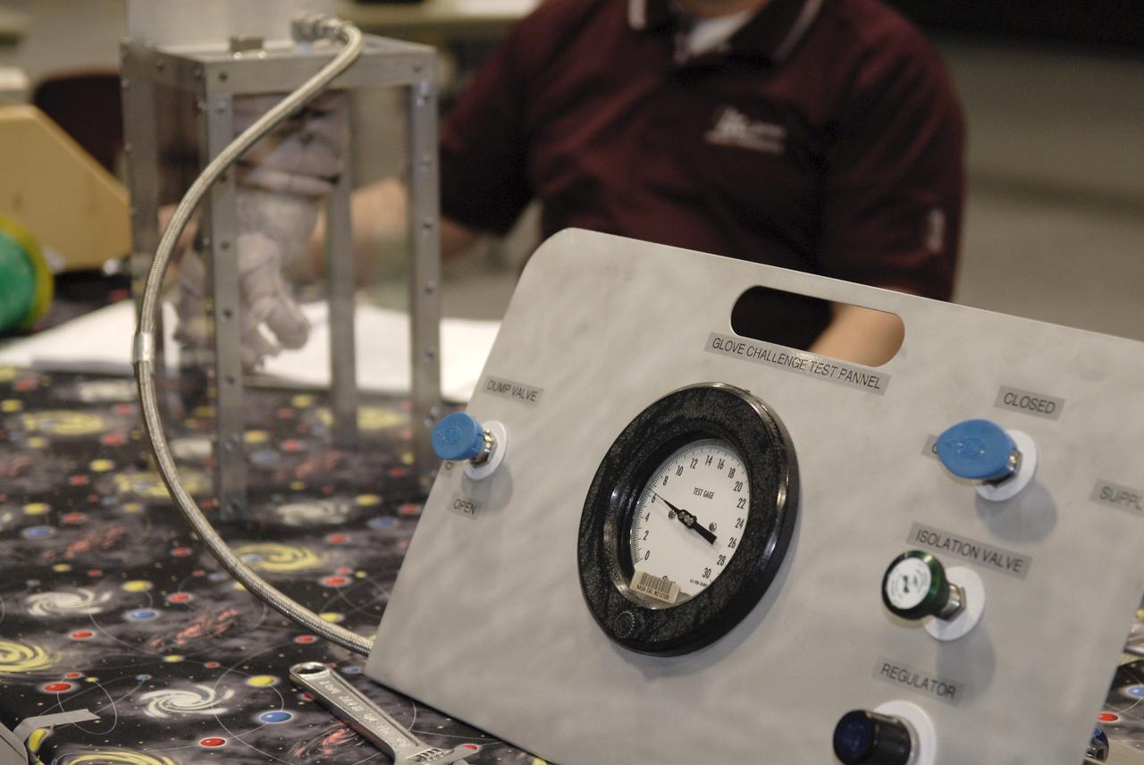 CAPE CANAVERAL, Fla. – This gauge is measuring how much internal pressure a newly designed glove can withstand during a burst test at the 2009 Astronaut Glove Challenge, part of NASA’s Centennial Challenges Program, at the Astronaut Hall of Fame near NASA’s Kennedy Space Center in Florida.    The nationwide competition focused on developing improved pressure suit gloves for astronauts to use while working in space.  During the challenge, inventors tested the gloves to measure dexterity and strength during operation in a glove box which simulates the vacuum of space.  Centennial Challenges is NASA’s program of technology prizes for the citizen-inventor.  The winning prize for the Glove Challenge is $250,000 provided by the Centennial Challenges Program.  Photo credit: NASA/Kim Shiflett