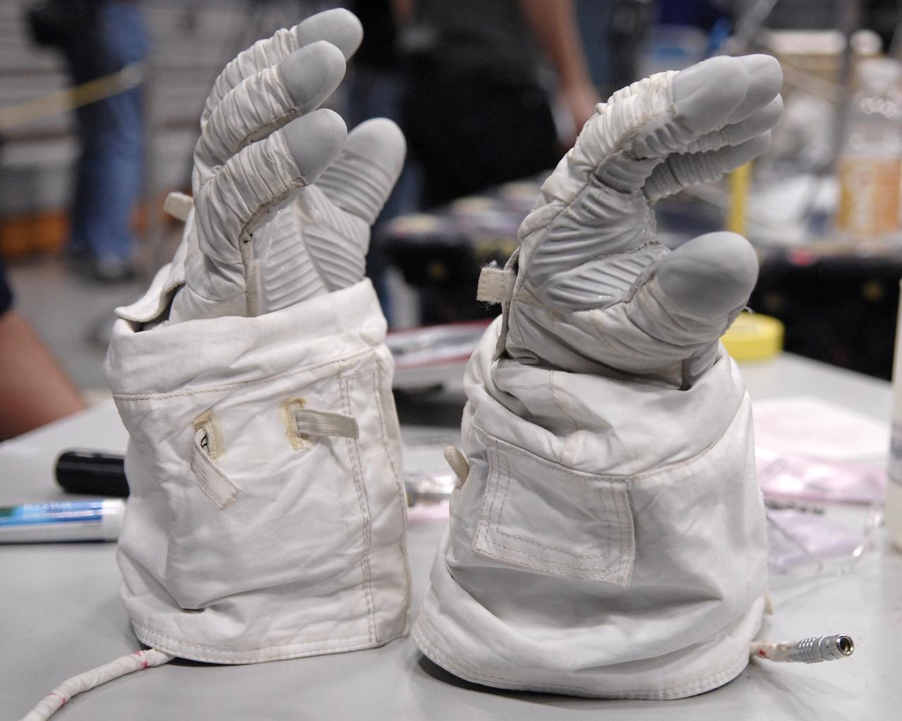 CAPE CANAVERAL, Fla. –  These newly designed gloves are entries in the 2009 Astronaut Glove Challenge, part of NASA’s Centennial Challenges Program, at the Astronaut Hall of Fame near NASA’s Kennedy Space Center in Florida.    The nationwide competition focused on developing improved pressure suit gloves for astronauts to use while working in space.  During the challenge, inventors tested the gloves to measure dexterity and strength during operation in a glove box which simulates the vacuum of space.  Centennial Challenges is NASA’s program of technology prizes for the citizen-inventor.  The winning prize for the Glove Challenge is $250,000 provided by the Centennial Challenges Program.  Photo credit: NASA/Kim Shiflett
