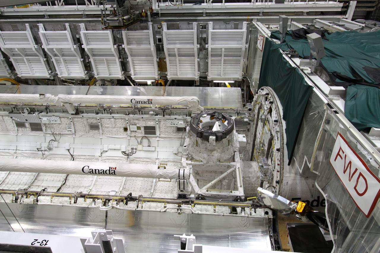 CAPE CANAVERAL, Fla. – In Orbiter Processing Facility-2 at NASA's Kennedy Space Center in Florida, processing of space shuttle Endeavour's payload bay is complete and its doors will be closed for the shuttle's move to the Vehicle Assembly Building. The move, or "rollover," is targeted for Dec. 12. The Tranquility module, the payload for Endeavour's STS-130 mission to the International Space Station, will be installed in the payload bay after the shuttle has reached the pad. Endeavour's launch is targeted for Feb. 4, 2010. For information on the STS-130 mission and crew, visit http://www.nasa.gov/mission_pages/shuttle/shuttlemissions/sts130/index.html. Photo credit: NASA/Jack Pfaller