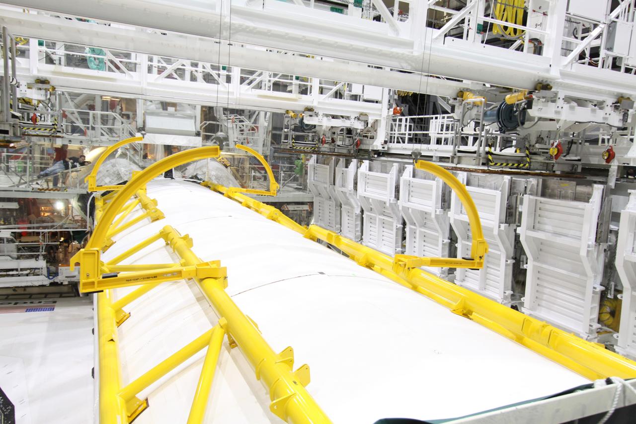 CAPE CANAVERAL, Fla. – In Orbiter Processing Facility-2 at NASA's Kennedy Space Center in Florida, space shuttle Endeavour's payload bay doors are closed for the shuttle's move to the Vehicle Assembly Building. The move, or "rollover," is targeted for Dec. 12. The Tranquility module, the payload for Endeavour's STS-130 mission to the International Space Station, will be installed in the payload bay after the shuttle has reached the pad. Endeavour's launch is targeted for Feb. 4, 2010. For information on the STS-130 mission and crew, visit http://www.nasa.gov/mission_pages/shuttle/shuttlemissions/sts130/index.html. Photo credit: NASA/Jack Pfaller