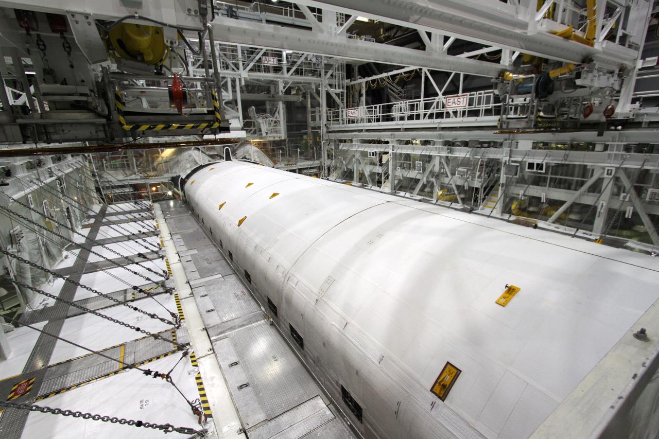 CAPE CANAVERAL, Fla. – In Orbiter Processing Facility-2 at NASA's Kennedy Space Center in Florida, processing of space shuttle Endeavour's payload bay is complete, and its doors are closed for the shuttle's move to the Vehicle Assembly Building. The move, or "rollover," is targeted for Dec. 12. The Tranquility module, the payload for Endeavour's STS-130 mission to the International Space Station, will be installed in the payload bay after the shuttle has reached the pad. Endeavour's launch is targeted for Feb. 4, 2010. For information on the STS-130 mission and crew, visit http://www.nasa.gov/mission_pages/shuttle/shuttlemissions/sts130/index.html. Photo credit: NASA/Jack Pfaller
