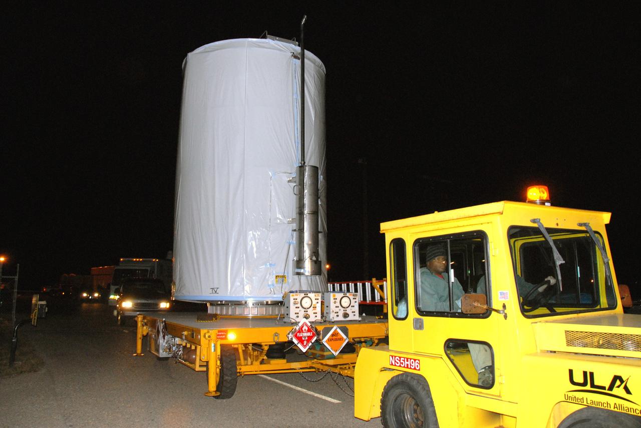 VANDENBERG AIR FORCE BASE, Calif. - A convoy accompanies NASA's Wide-field Infrared Survey Explorer, or WISE, enclosed in a transportation canister, from the Astrotech payload processing facility at Vandenberg Air Force Base in California to Space Launch Complex 2.    WISE will survey the entire sky at infrared wavelengths, creating a cosmic clearinghouse of hundreds of millions of objects which will be catalogued and provide a vast storehouse of knowledge about the solar system, the Milky Way, and the universe. Launch is scheduled for Dec. 9.  For additional information, visit http://www.nasa.gov/wise.  Photo credit: NASA/Doug Kulkow, VAFB