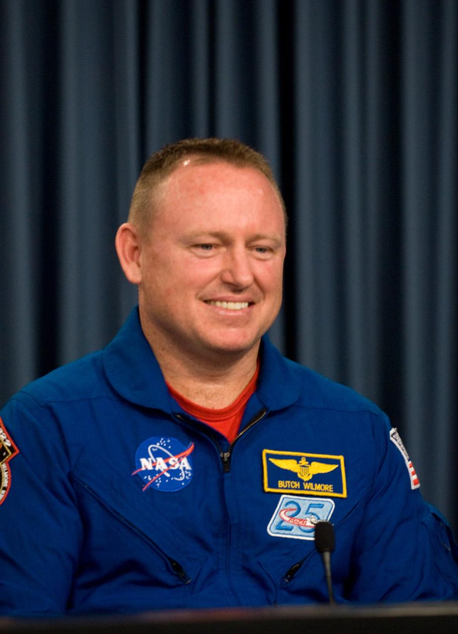 CAPE CANAVERAL, Fla. - STS-129 Pilot Barry E. Wilmore participates in a news conference in the NASA Press Site auditorium at NASA's Kennedy Space Center in Florida on landing day. Space shuttle Atlantis' main gear touchdown on Kennedy's Shuttle Landing Facility was at 9:44:23 a.m. EST. Nose gear touchdown was at 9:44:36 a.m., and wheels stop was at 9:45:05 a.m. STS-129 is the final space shuttle Expedition crew rotation flight on the manifest. On STS-129, the crew delivered 14 tons of cargo to the orbiting laboratory, including two ExPRESS Logistics Carriers containing spare parts to sustain station operations after the shuttles are retired next year. For information on the STS-129 mission and crew, visit http://www.nasa.gov/mission_pages/shuttle/shuttlemissions/sts129/index.html. Photo credit: NASA/Kim Shiflett