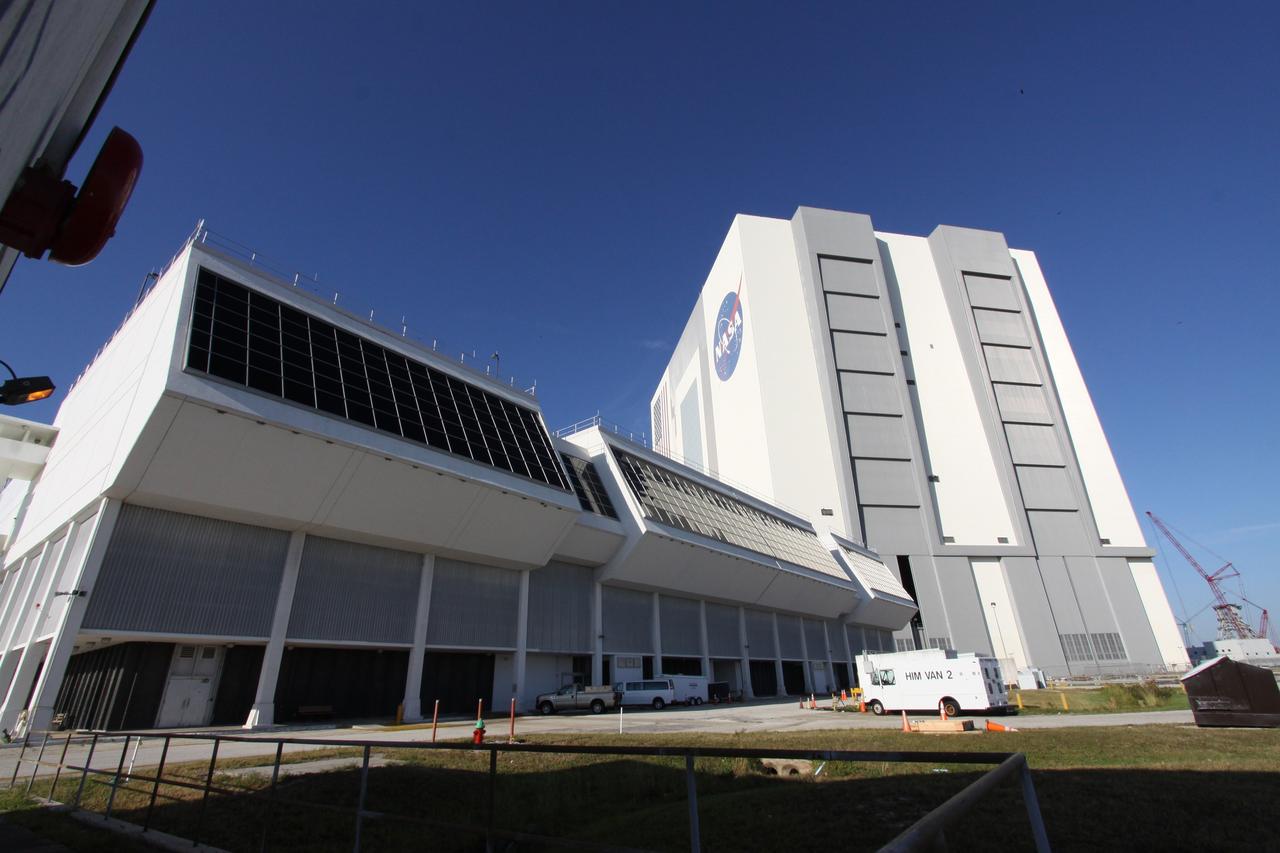 CAPE CANAVERAL, Fla. – The Launch Control Center at NASA's Kennedy Space Center in Florida is ready to support NASA's 21st century space program. The louvered windows installed during the Apollo era have been replaced with new, hurricane-rated window systems in the four firing rooms and vestibule areas between the firing rooms. To avoid operational impacts and protect the firing rooms from the elements, the new windows were installed on the outside of the original windows, enclosing the space formerly occupied by the louvers until the new windows were leak tested. Photo credit: NASA/Jack Pfaller