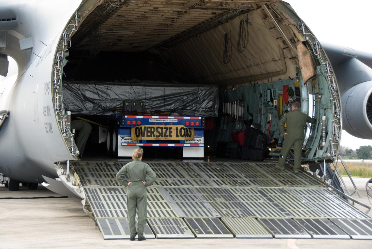 CAPE CANAVERAL, Fla. - At the Shuttle Landing Facility at NASA's Kennedy Space Center in Florida, preparations are under way to offload the ExPRESS Logistics Carrier 3, or ELC-3, from a U.S. Air Force C-5 aircraft. ELC-3 and the Alpha Magnetic Spectrometer are the primary payloads for space shuttle Endeavour's STS-134 mission to the International Space Station. The STS-134 crew will also deliver spare parts including two S-band communications antennas, a high pressure gas tank, additional spare parts for Dextre and micrometeoroid debris shields. Endeavour's launch is targeted for July 29, 2010. For information on the STS-134 mission objectives and crew, visit http://www.nasa.gov/shuttle. Photo credit: NASA/Kim Shiflett