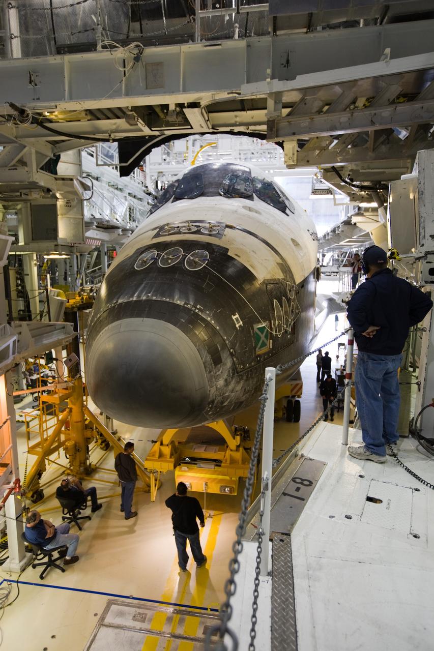CAPE CANAVERAL, Fla. – In Orbiter Processing Facility-2 at NASA's Kennedy Space Center in Florida, preparations are under way to roll space shuttle Endeavour to the Vehicle Assembly Building. The rollover began at 12:53 a.m. EST and was completed at 2:08 p.m. when Endeavour was towed into the VAB's transfer aisle. Next, Endeavour will be attached to a lifting sling, hoisted over a transom and lowered into High Bay 1, where it will be attached to its external fuel tank and solid rocket boosters. Rollout of the shuttle stack to Kennedy’s Launch Pad 39A, a significant milestone in launch processing activities, is planned for early January 2010. The Italian-built Tranquility module, the primary payload for Endeavour's STS-130 mission, will be installed in the payload bay after the shuttle arrives at the pad. Launch is targeted for early February. For information on the STS-130 mission and crew, visit http://www.nasa.gov/mission_pages/shuttle/shuttlemissions/sts130/index.html. Photo credit: NASA/Dimitri Gerondidakis
