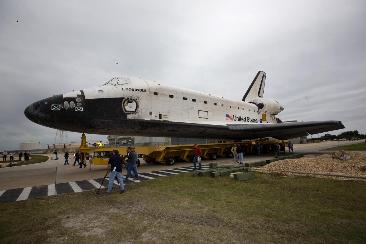CAPE CANAVERAL, Fla. – At NASA's Kennedy Space Center in Florida, space shuttle Endeavour makes its way from Orbiter Processing Facility-2 to the Vehicle Assembly Building. The rollover began at 12:53 a.m. EST and was completed at 2:08 p.m. when Endeavour was towed into the VAB's transfer aisle. Next, Endeavour will be attached to a lifting sling, hoisted over a transom and lowered into High Bay 1, where it will be attached to its external fuel tank and solid rocket boosters. Rollout of the shuttle stack to Kennedy’s Launch Pad 39A, a significant milestone in launch processing activities, is planned for early January 2010. The Italian-built Tranquility module, the primary payload for Endeavour's STS-130 mission, will be installed in the payload bay after the shuttle arrives at the pad. Launch is targeted for early February. For information on the STS-130 mission and crew, visit http://www.nasa.gov/mission_pages/shuttle/shuttlemissions/sts130/index.html. Photo credit: NASA/Dimitri Gerondidakis