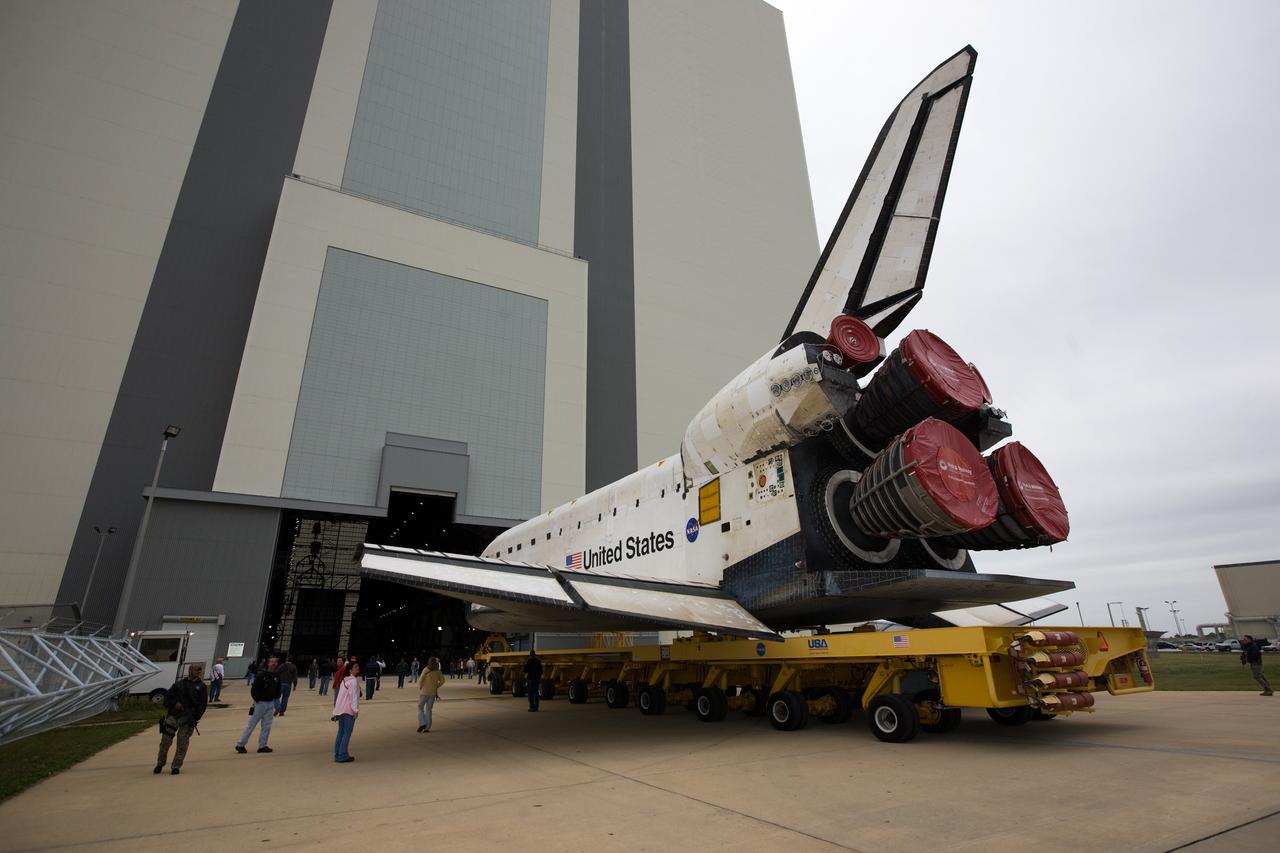 CAPE CANAVERAL, Fla. – At NASA's Kennedy Space Center in Florida, space shuttle Endeavour rolls into the Vehicle Assembly Building transfer aisle. The rollover began at 12:53 a.m. EST and was completed at 2:08 p.m. when Endeavour was towed into the VAB's transfer aisle. Next, Endeavour will be attached to a lifting sling, hoisted over a transom and lowered into High Bay 1, where it will be attached to its external fuel tank and solid rocket boosters. Rollout of the shuttle stack to Kennedy’s Launch Pad 39A, a significant milestone in launch processing activities, is planned for early January 2010. The Italian-built Tranquility module, the primary payload for Endeavour's STS-130 mission, will be installed in the payload bay after the shuttle arrives at the pad. Launch is targeted for early February. For information on the STS-130 mission and crew, visit http://www.nasa.gov/mission_pages/shuttle/shuttlemissions/sts130/index.html. Photo credit: NASA/Dimitri Gerondidakis